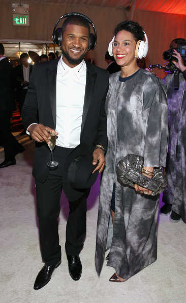 Usher and Grace Miguel attend the 8th Annual HEAVEN Gala presented by Art of Elysium and Samsung Galaxy at Hangar 8 in Los Angeles on Jan. 10, 2015 (Jonathan Leibson—Getty Images)