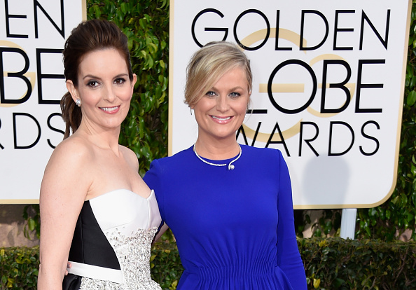 Tina Fey and Amy Poehler attend the 72nd Annual Golden Globe Awards at the Beverly Hilton Hotel in Los Angeles on Jan. 11, 2015 (Frazer Harrison—Getty Images)