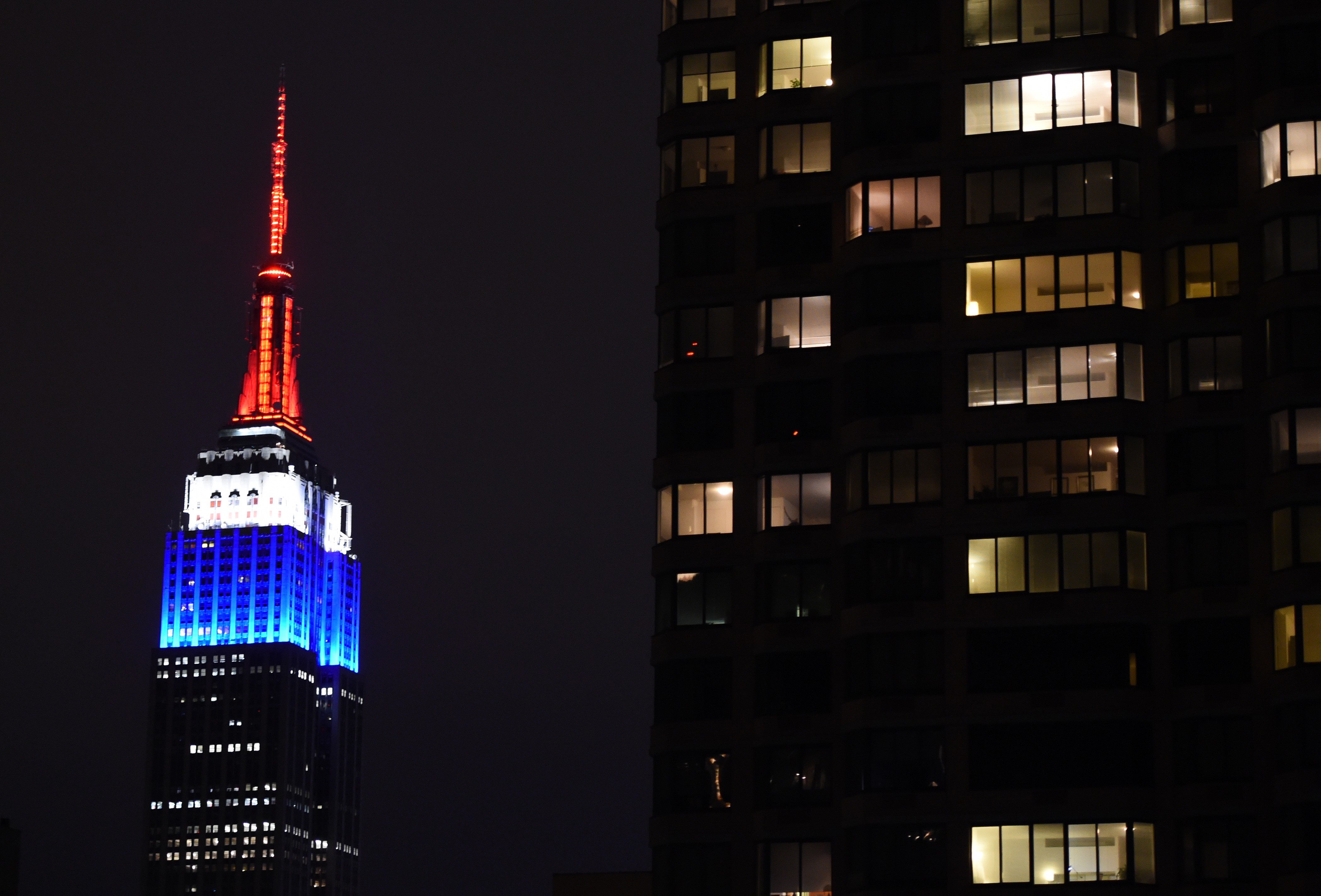 The Empire State building is lighted up in the colors of the French flag to pay tribute to those that lost their lives in the terrorist attacks at Charlie Hedbo on January 11, 2015 in New York. (TIMOTHY A. CLARY—AFP/Getty Images)