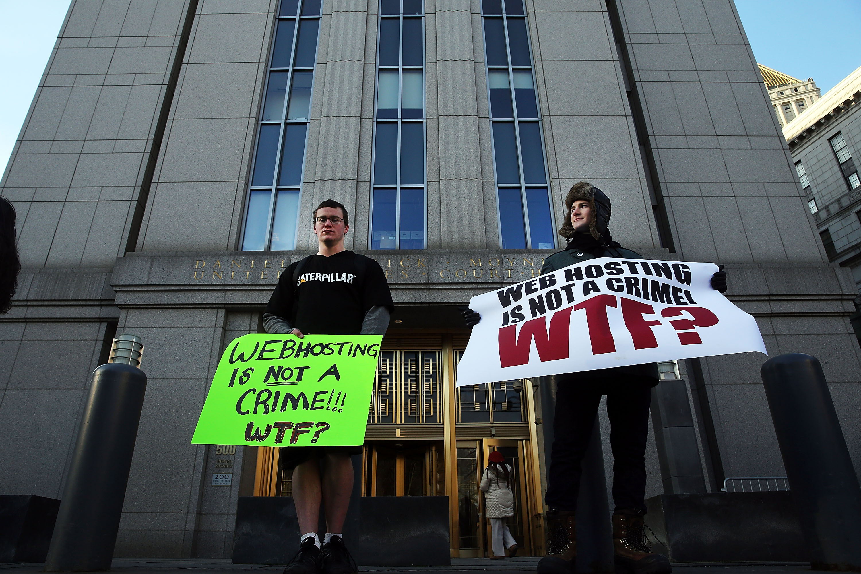 Supporters of Ross Ulbricht, the alleged creator and operator of the Silk Road underground market, stand in front of a Manhattan federal court house on the first day of jury selection for his trial on January 13, 2015 in New York City. (Spencer Platt—Getty Images)