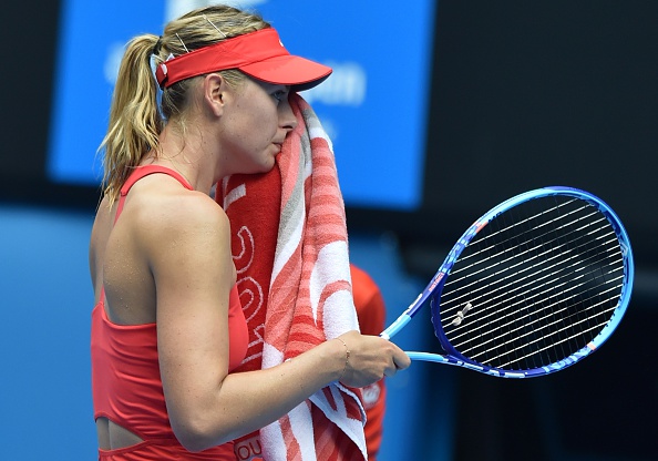 Russia's Maria Sharapova reacts during her women's singles match against Russia's Alexandra Panova at the 2015 Australian Open in Melbourne on Jan. 21, 2015 (Paul Crock—AFP/Getty Images)