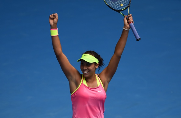 Madison Keys celebrates winning her women's singles match against Venus Williams at the 2015 Australian Open in Melbourne on Jan. 28, 2015 (Manan Vatsyayana—AFP/Getty Images)