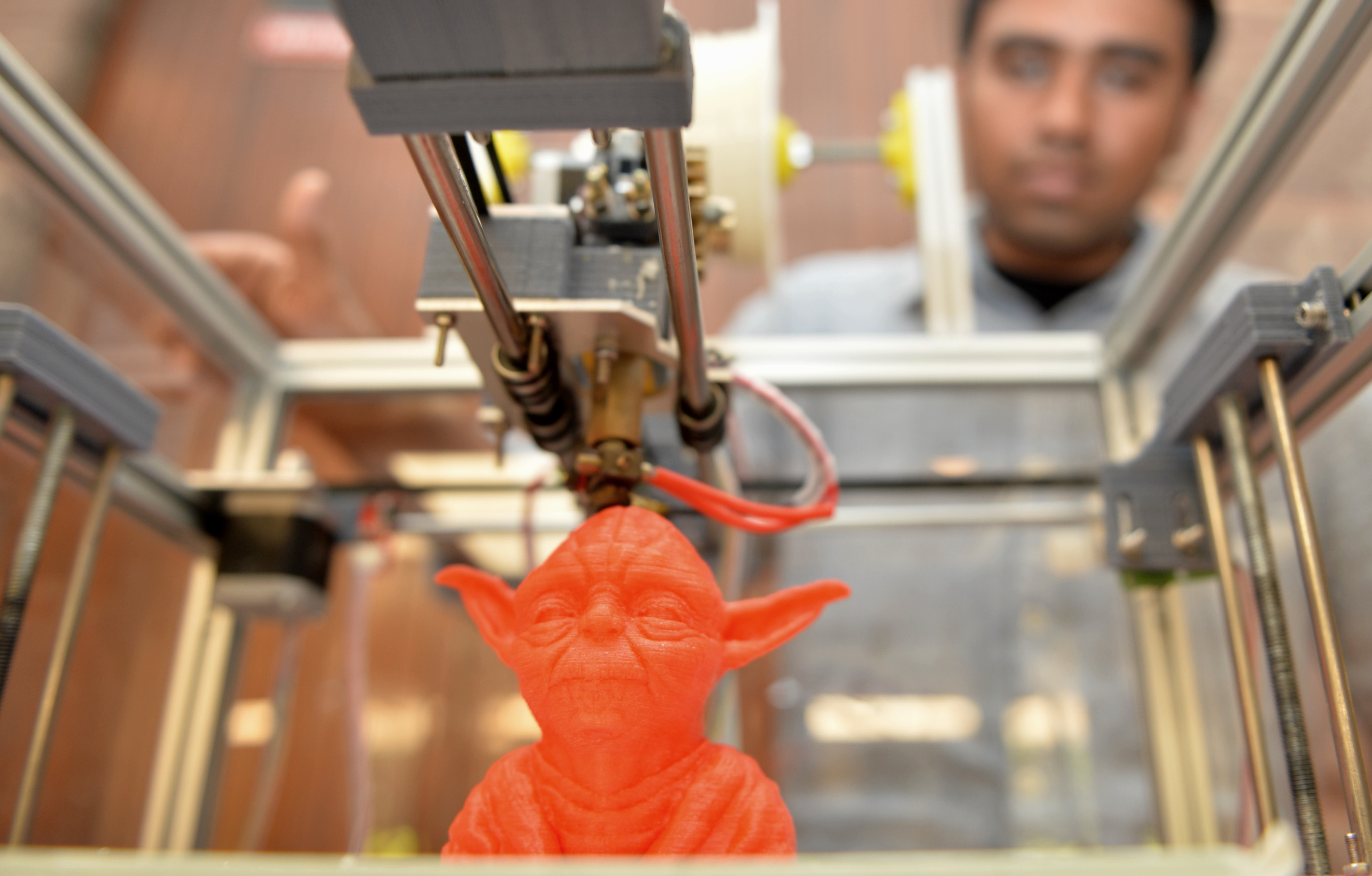 A bust of <i>Star Wars</i> film character Yoda is seen printed on a portable 3D printer during the Pravega 2014 science and technology festival at the Indian Institute of Science (IISc) in Bangalore on January 31, 2014. (AFP&mdash;AFP/Getty Images)