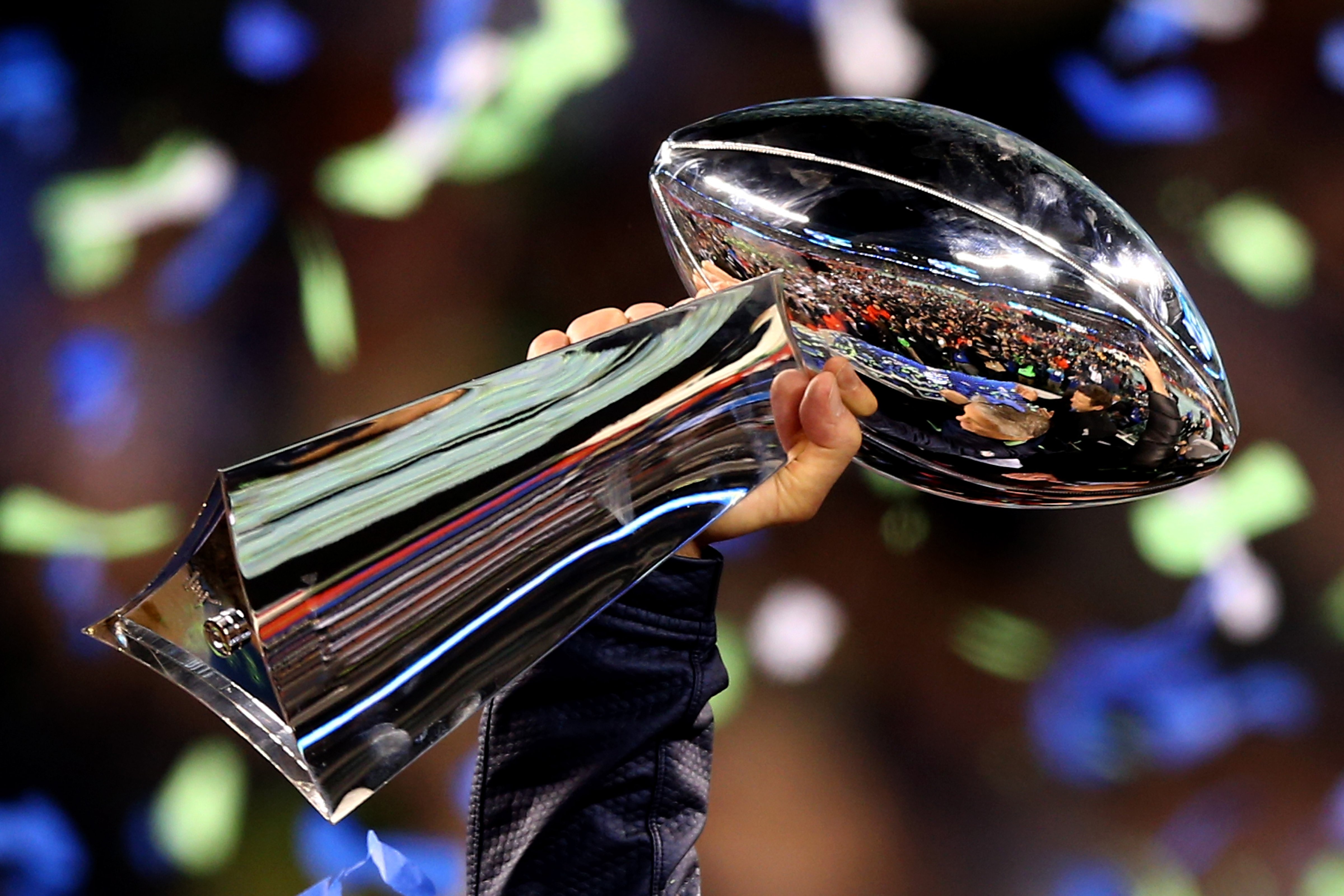 Head coach Pete Carroll of the Seattle Seahawks holds the Vince Lombardi Trophy after his team won Super Bowl XLVIII at MetLife Stadium on February 2, 2014 in East Rutherford, New Jersey. (Elsa&mdash;Getty Images)