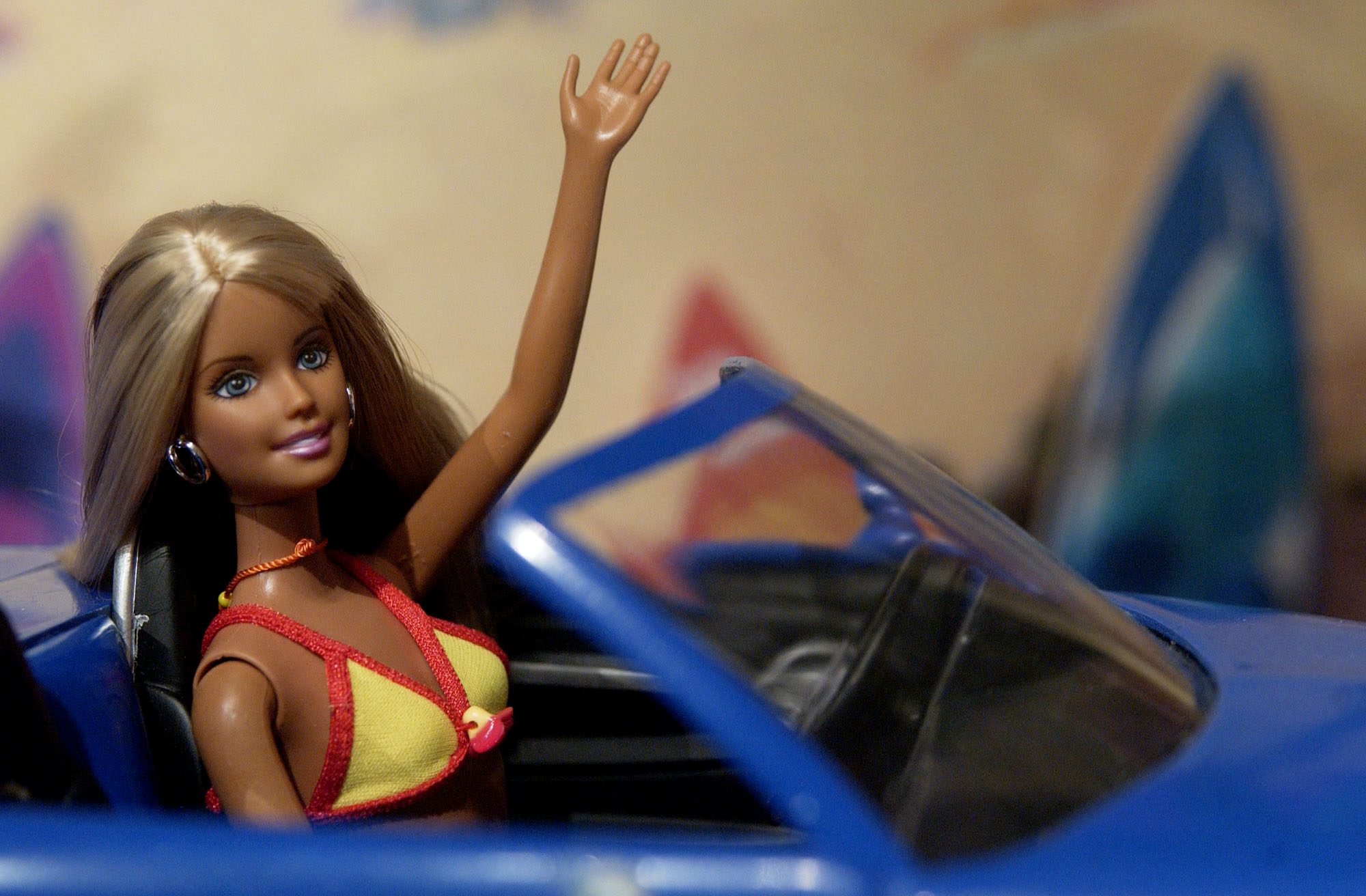Cali Girl Barbie waves from the front seat of a Chevy (Bloomberg&mdash;Bloomberg via Getty Images)