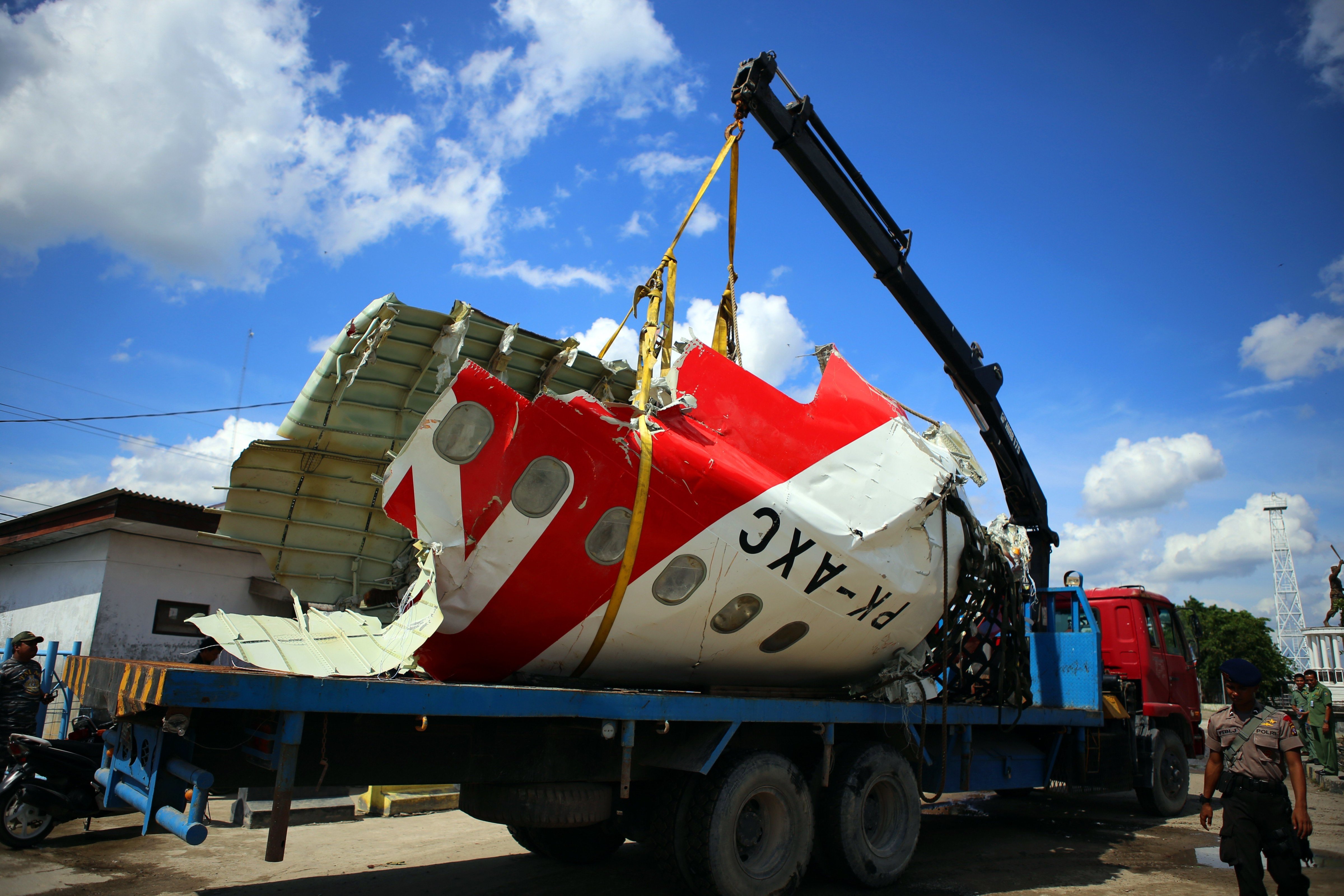 AirAsia aircraft tail is recovered from the Java Sea on Jan. 12, 2015, in Pangkalan Bun, Indonesia (Denny Pohan—Demotix/Corbis)