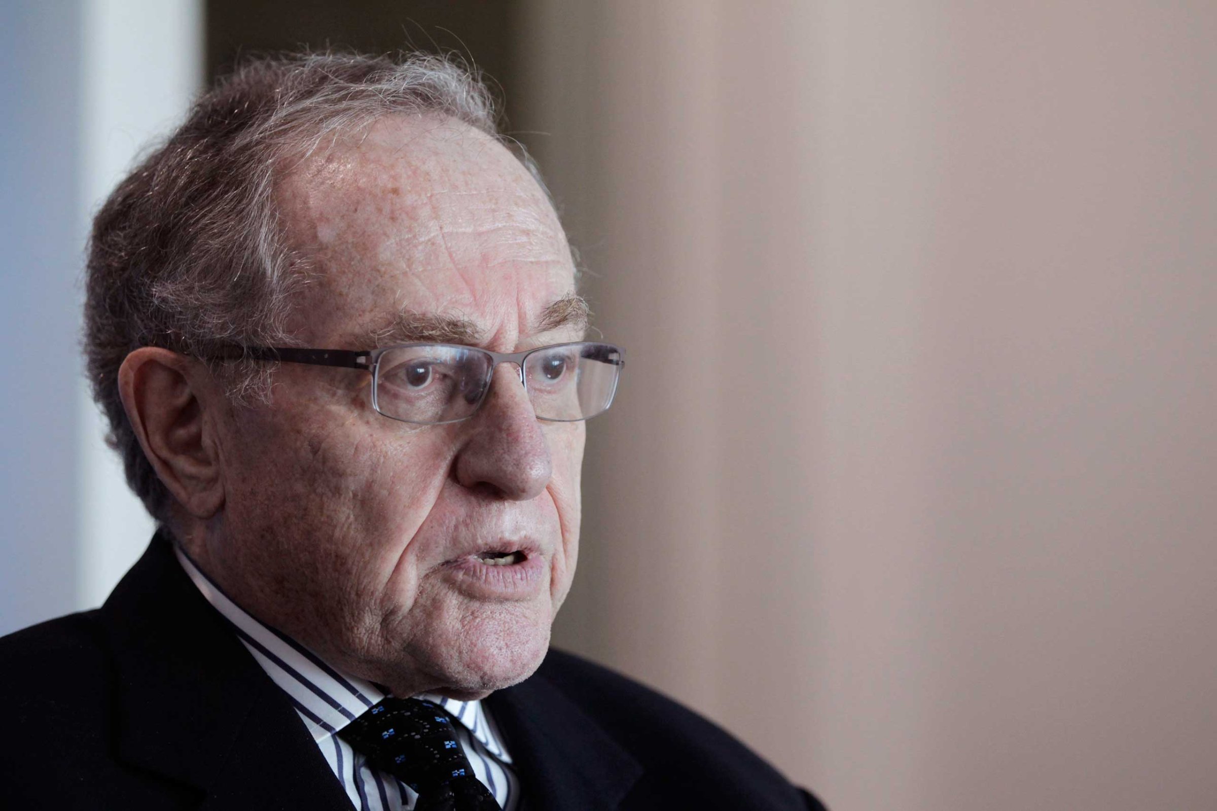 Attorney and law professor Alan Dershowitz discusses allegations of sex with an underage girl levelled against him, during an interview at his home in Miami Beach
