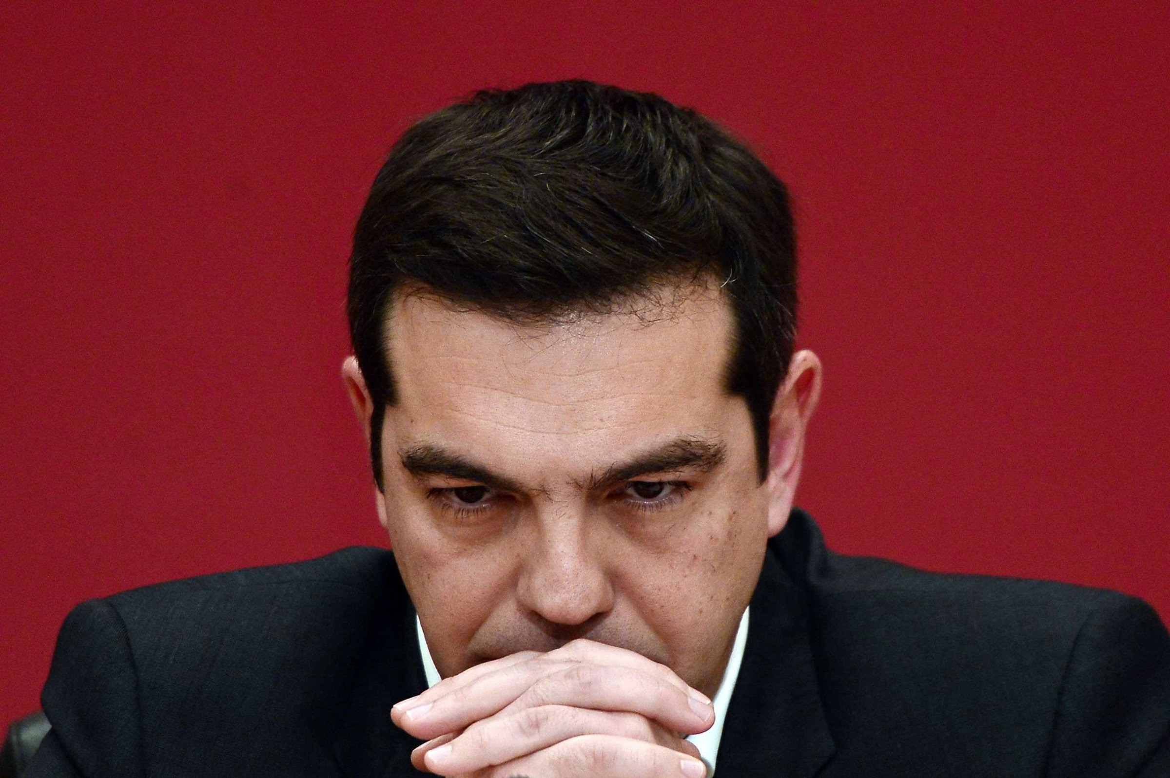 The leader of Syriza party, Alexis Tsipras, listens to a question during a televised press conference on Jan. 23, 2015 at the Zappion Hall in Athens.