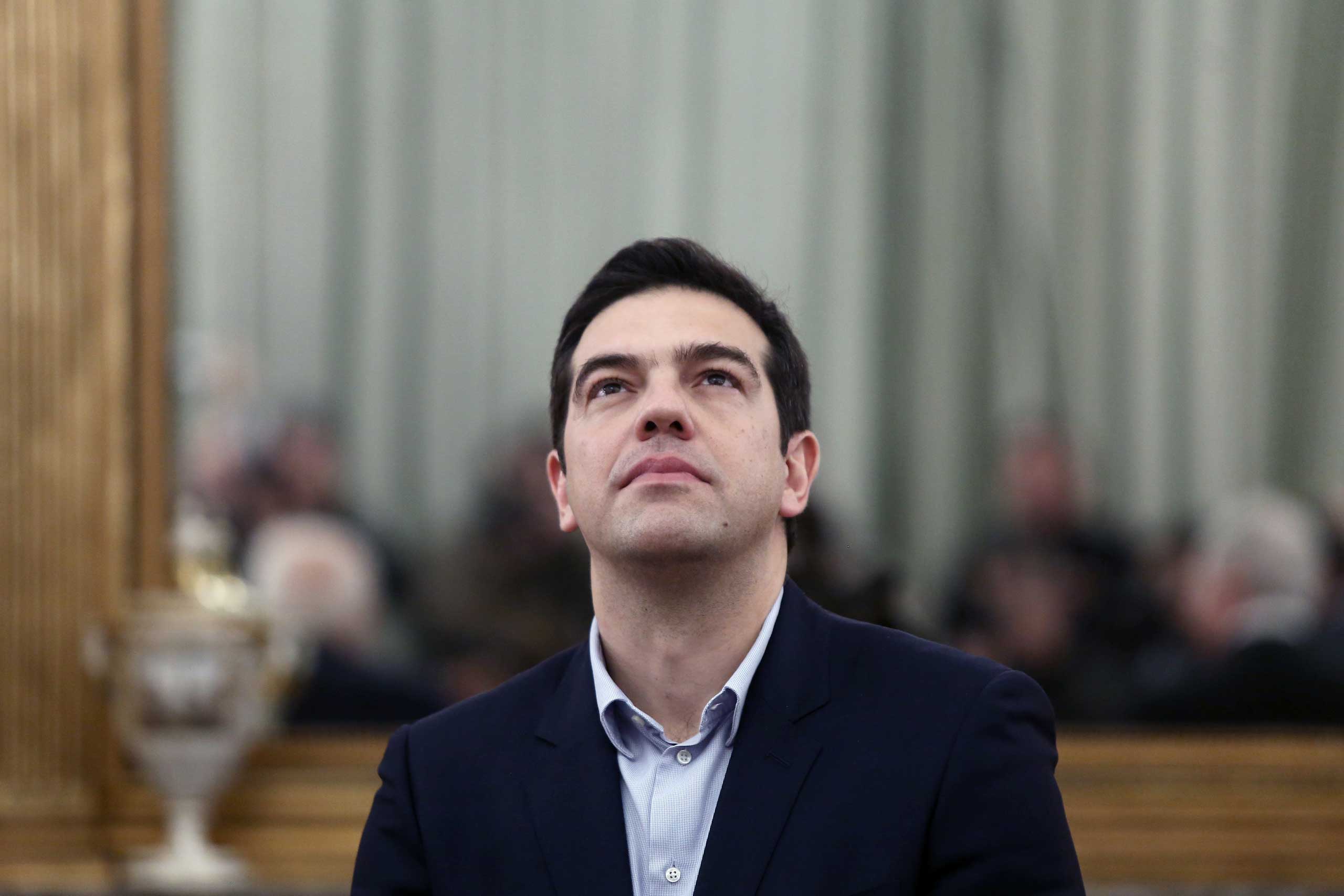 Greek Prime Minister and Syriza party leader Alexis Tsipras, at the Presidential palace during the swearing in ceremony of the new Greek Government, Athens, Jan. 27, 2015 . (Panayiotis Tzamaros/NurPhoto/Corbis)