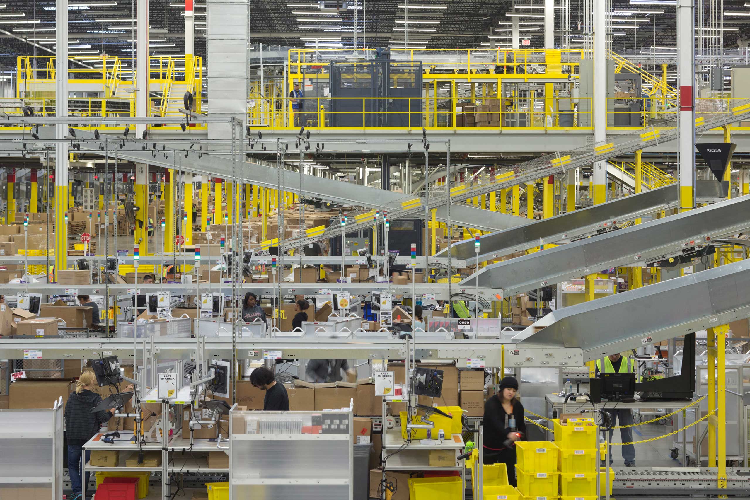 The packaging process at the Amazon fulfillment center in Tracy, Calif. on Nov. 21, 2014. (Stephen Wilkes For TIME)