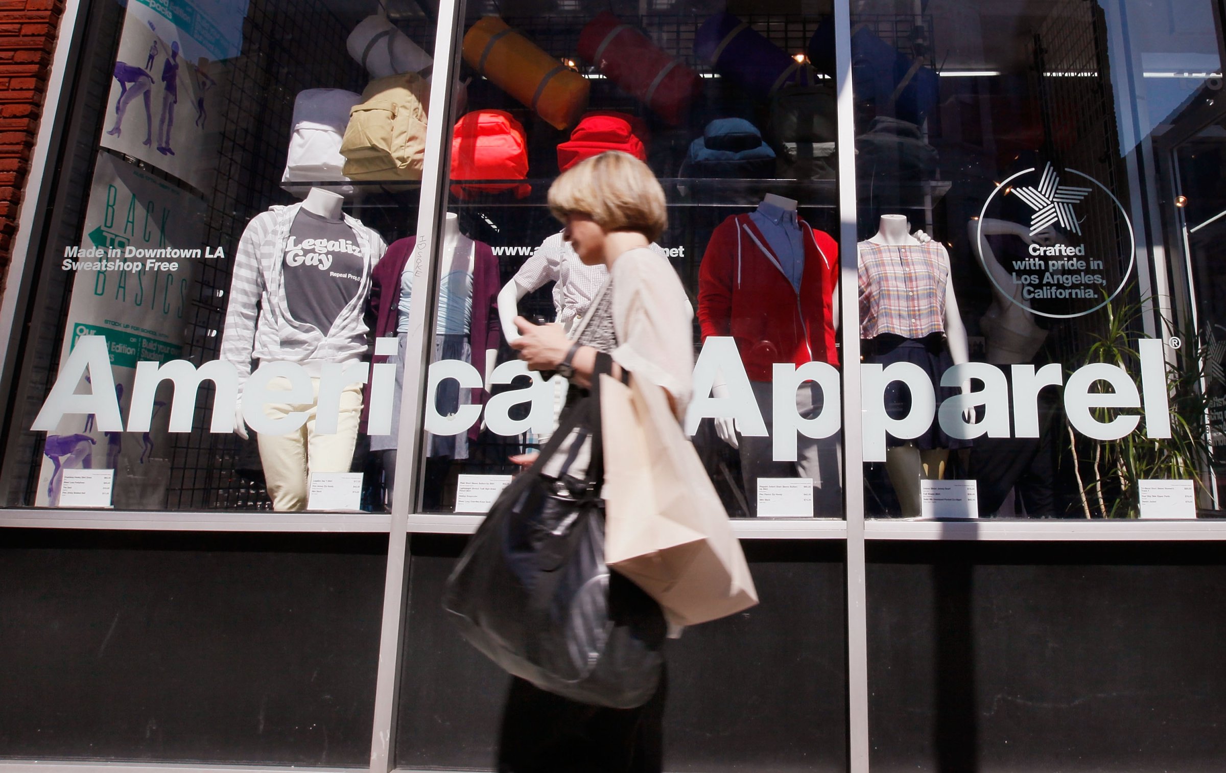 A pedestrian passes by an American Apparel store on Sept. 4, 2009 in Chicago, Illinois.