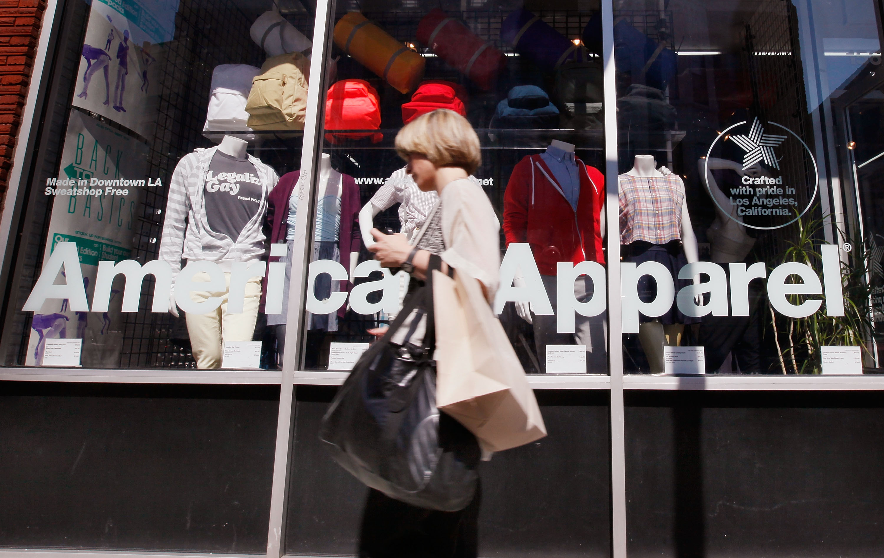 A pedestrian passes by an American Apparel store on Sept. 4, 2009 in Chicago, Illinois. (Scott Olson—Getty Images)