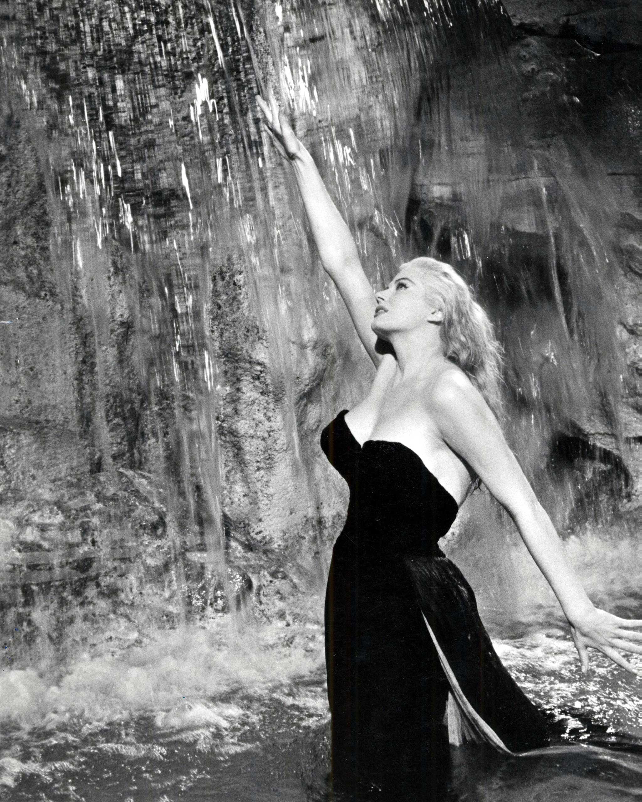 Ekberg as the Marilyn Monroe-like Sylvia, playing in Rome's Trevi fountain in La Dolce Vita in1960.
