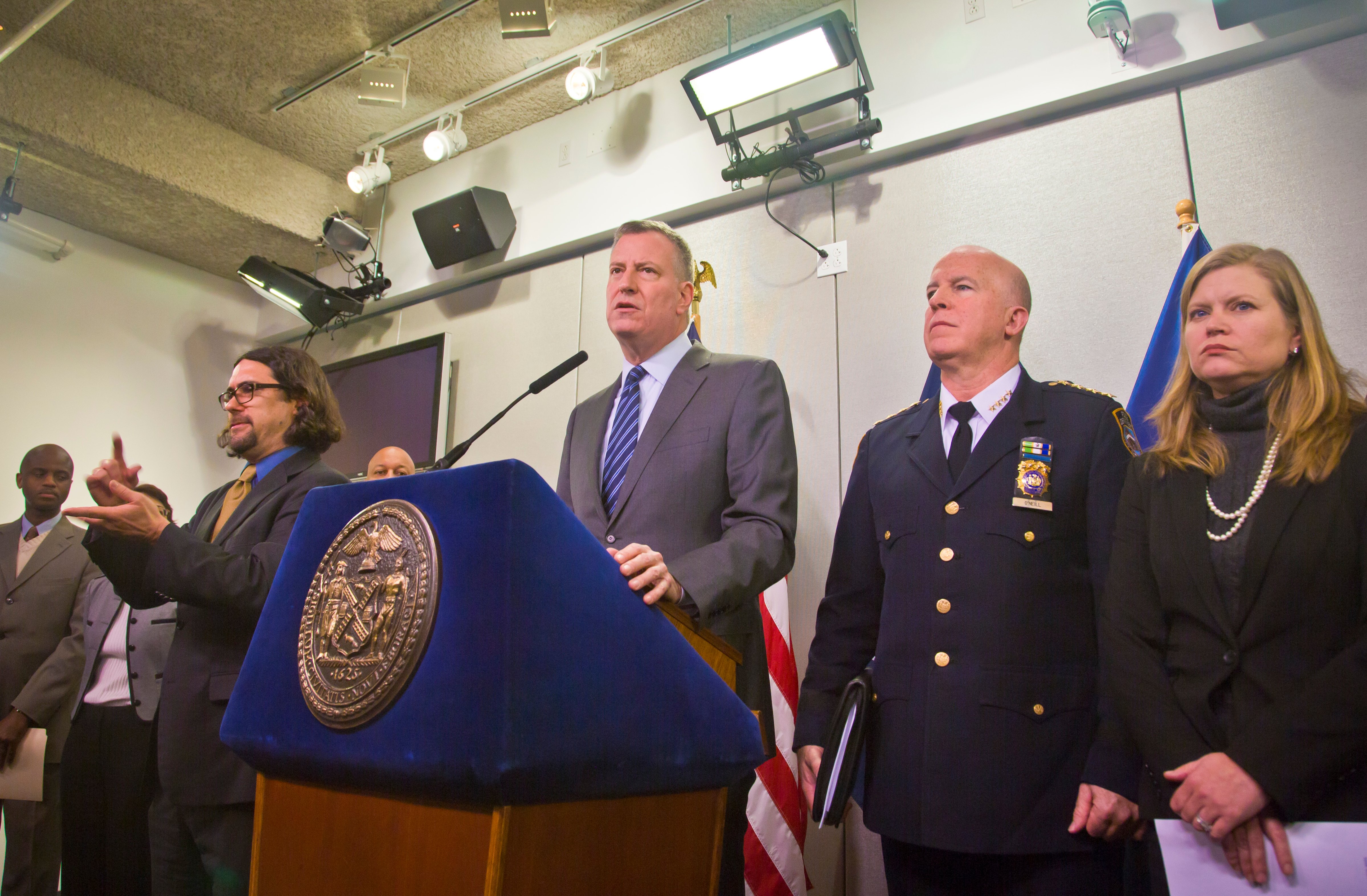 New York City Mayor Bill de Blasio, center, and top city officials hold press conference at the city's Office of Emergency Management, Monday, Jan. 26, 2015, in New York (Bebeto Matthews—AP)