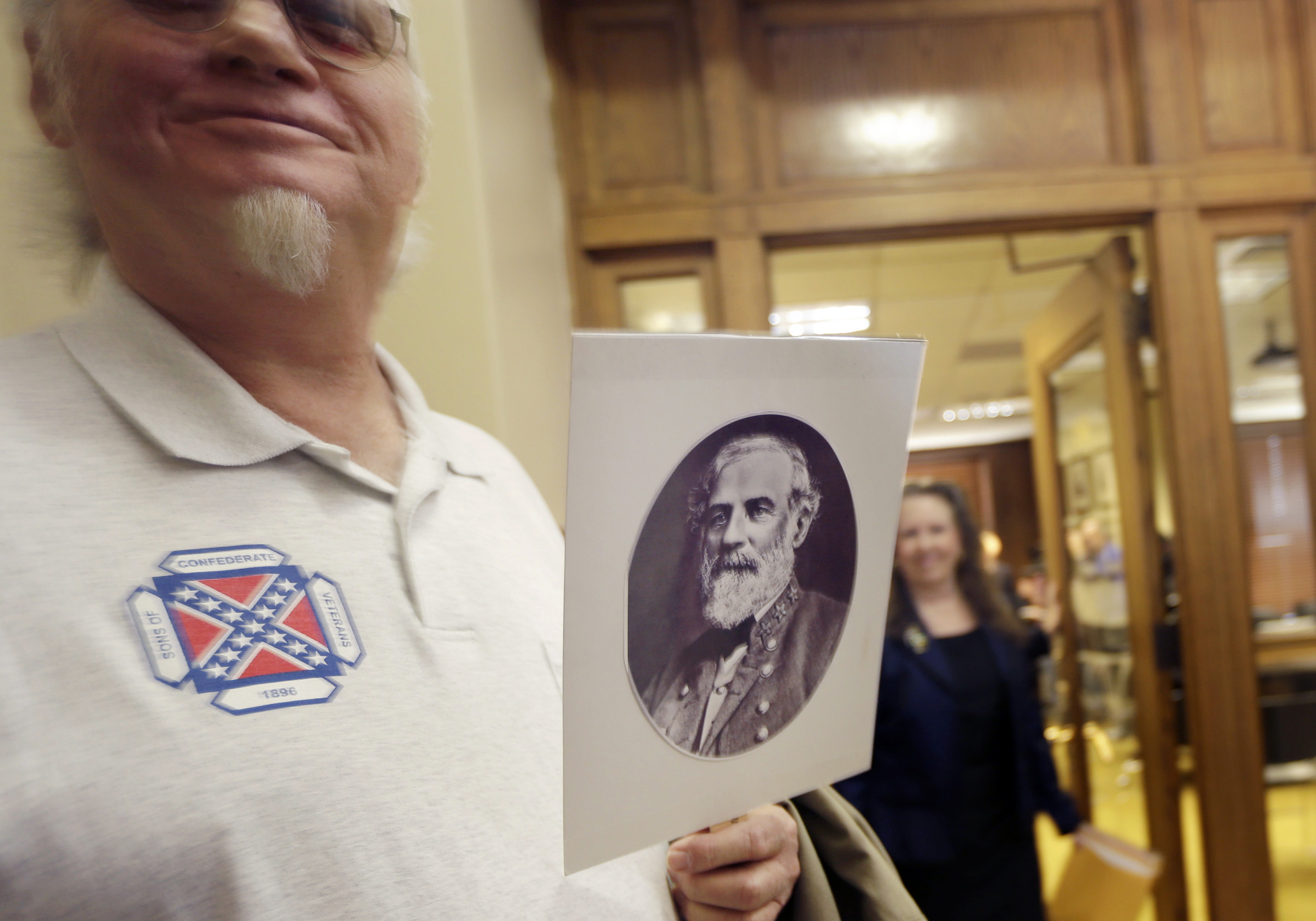 Dewey Spencer, of Judsonia, Ark., holds a portrait of Confederate Gen. Robert E. Lee after a meeting of the House Committee on State Agencies and Governmental Affairs, Wednesday, Jan. 28, 2015, at the State Capitol in Little Rock, Ark. (Danny Johnston—AP)