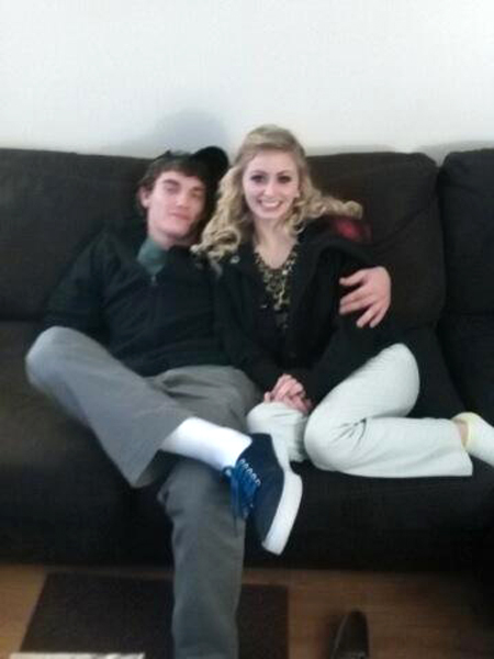 In this December 2014 file photo provided by Tammy Martin, her son Dalton Hayes poses with his girlfriend Cheyenne Phillips at his family's home in Leitchfield, Ky. Kentucky authorities say two teenage sweethearts suspected in a crime spree of stolen vehicles and pilfered checks across the South have been apprehended in in Panama City Beach, Fla., on Jan. 18, 2015 (Tammy Martin—AP)