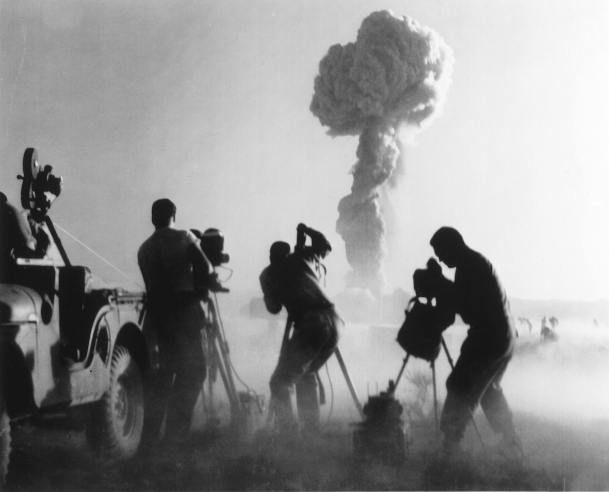 Capturing an atomic explosion at a test site in the Nevada desert in 1957. (Interim Archives / Getty Images)