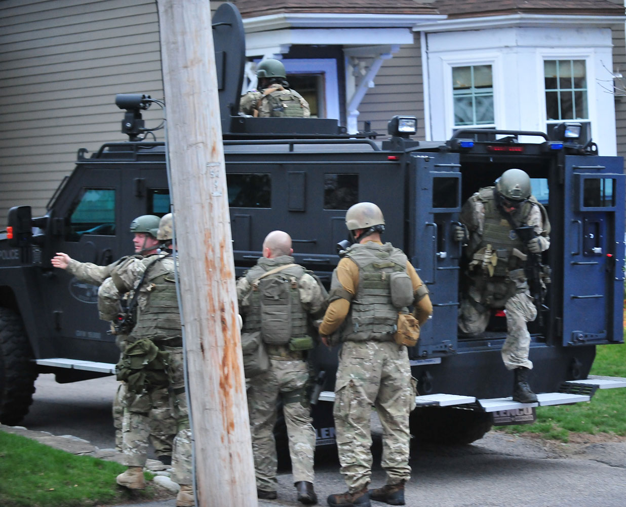 6:15.04 p.m.  Massachusetts State Police troopers prepare for the final assault on the boat where Tsarnaev was hiding.