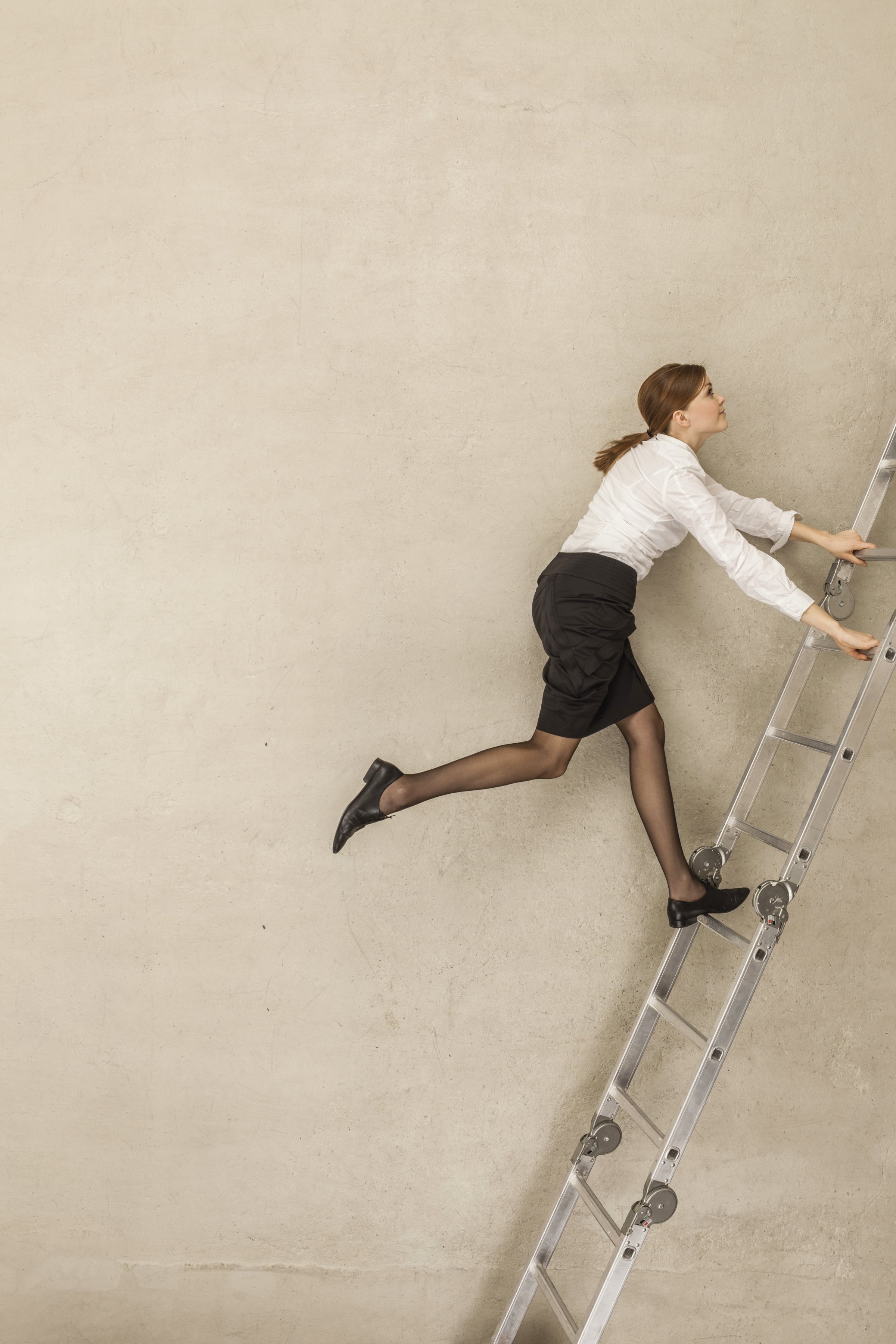 businesswoman-climbing-up-ladder