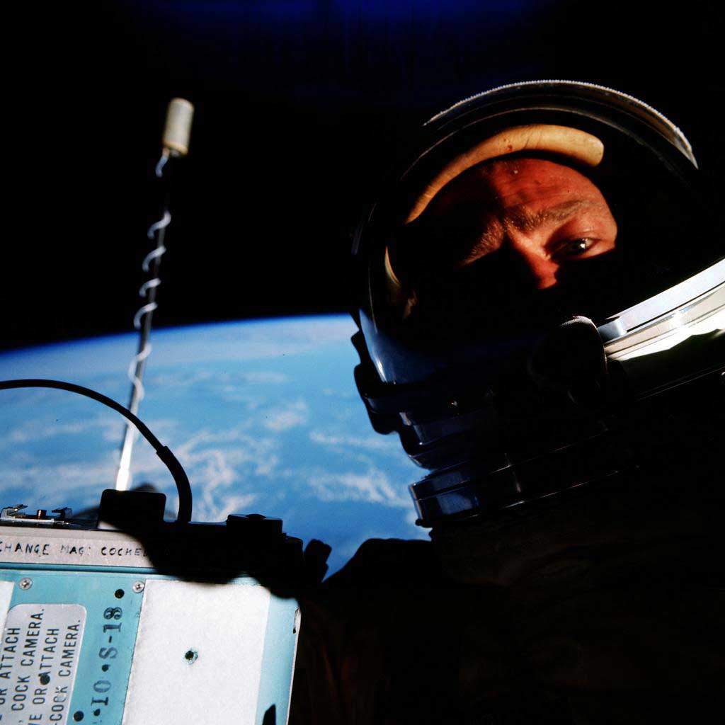 Buzz Aldrin claims to have taken the first 'space selfie' during a spacewalk in Nov. 1966. However, a few months earlier in July 1966 during the Gemini 10 mission Astronaut Michael Collins also snapped a selfie, however he was inside of the space capsule.