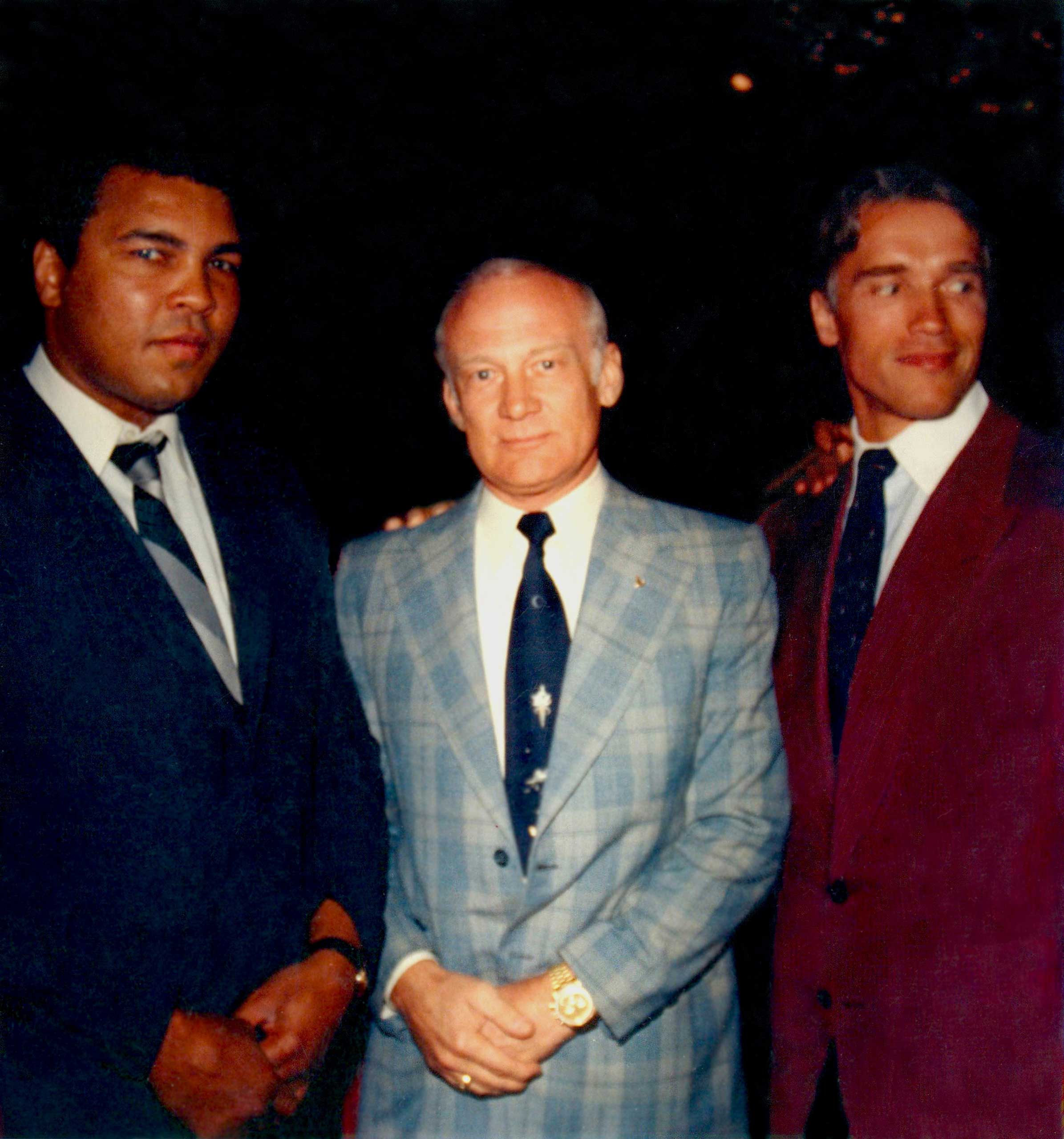 Buzz Aldrin with Muhammad Ali and Arnold Schwarzenegger.