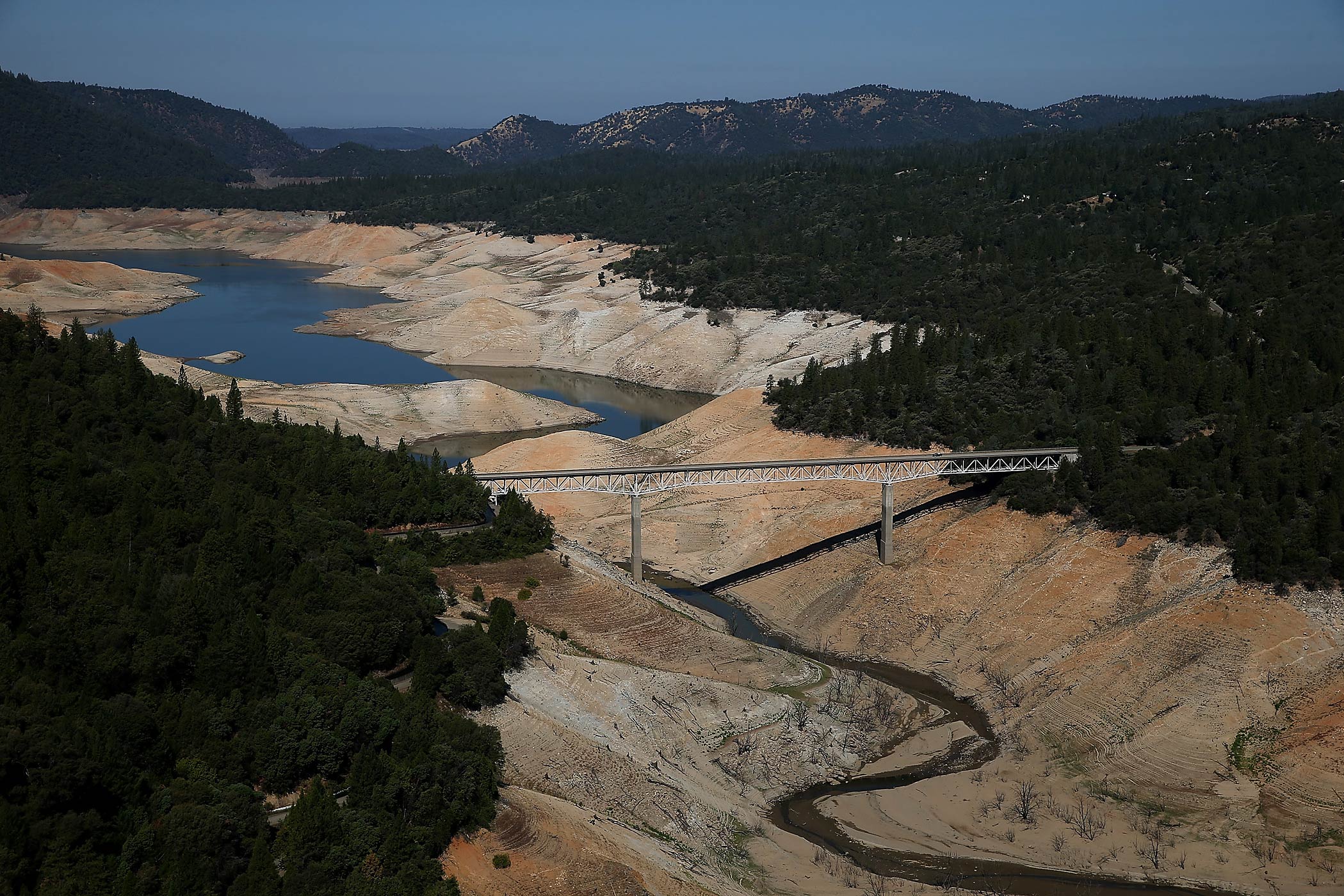 The Enterprise Bridge passes over a section of Lake Oroville that is nearly dry in Oroville, Calif., Aug. 2014. (Justin Sullivan—Getty Images)