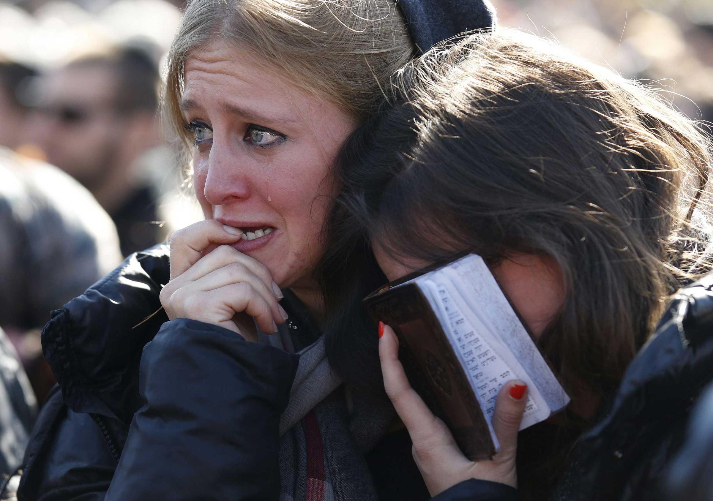 Mourners react in Jerusalem on Jan. 13, 2015 during the funeral of four Jews killed in an Islamist attack on a kosher supermarket in Paris last week.