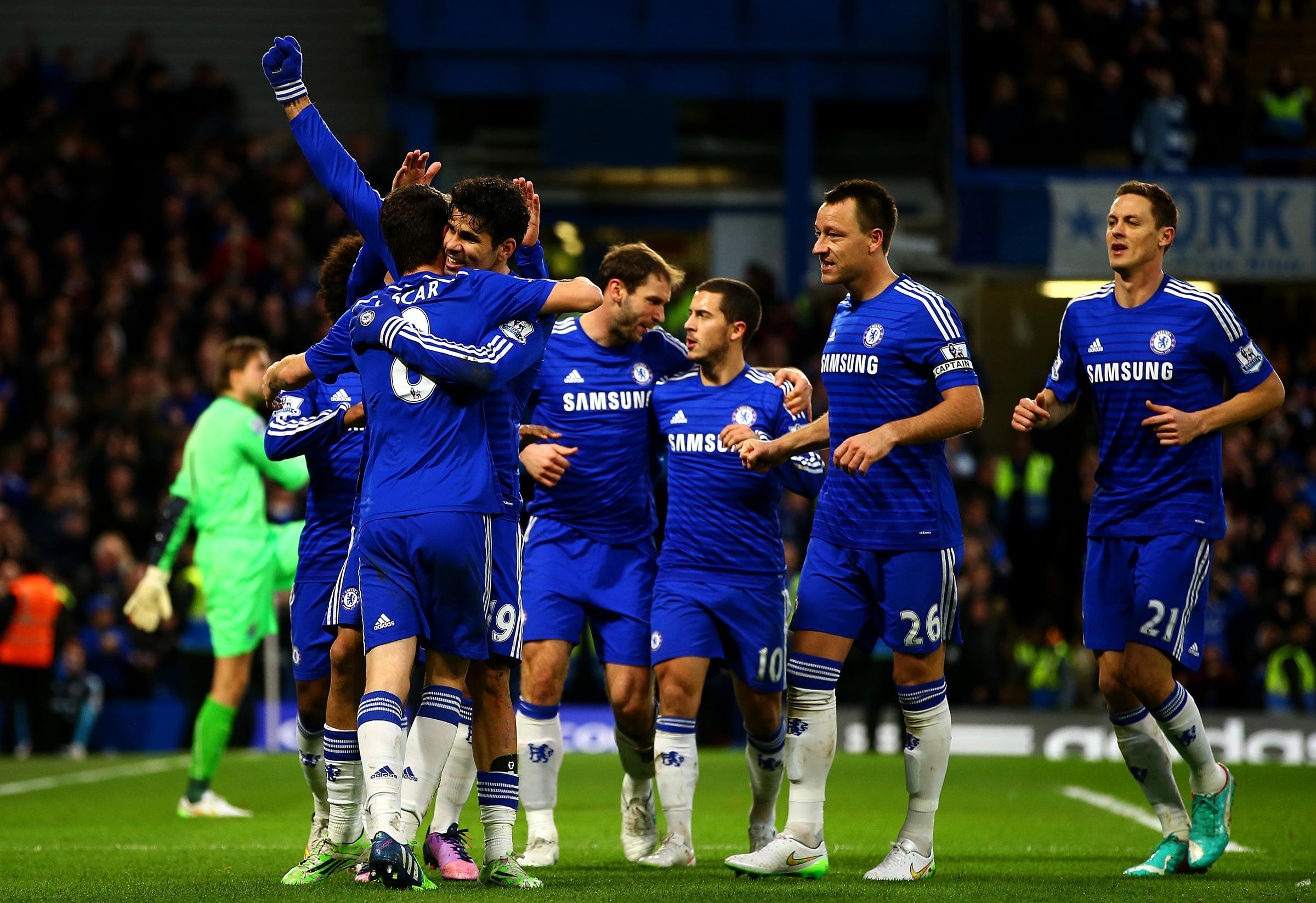 Diego Costa of Chelsea celebrates with team-mates after scoring his team's second goal during the Barclays Premier League match between Chelsea and Newcastle United at Stamford Bridge on Jan. 10, 2015 in London.