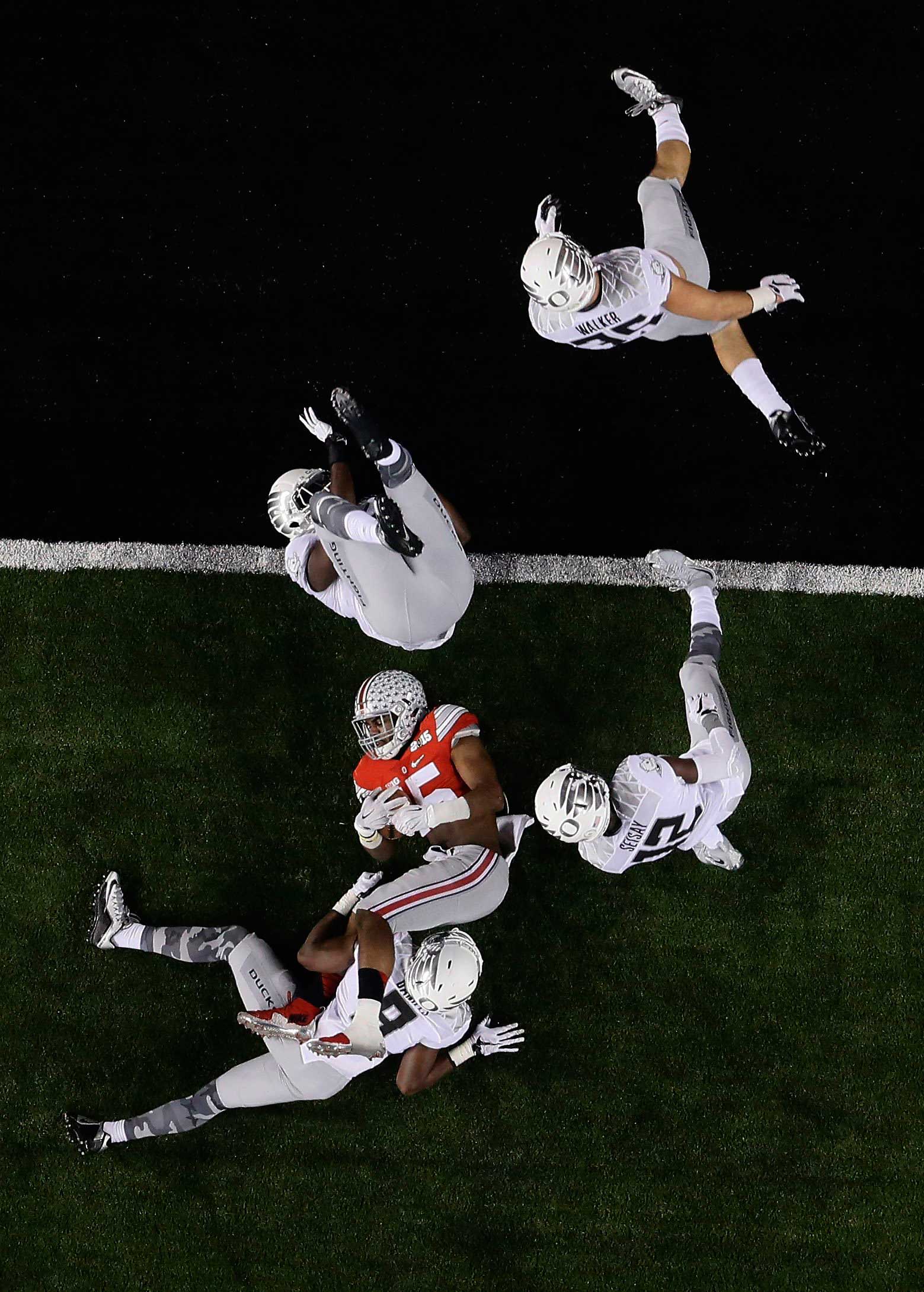 Ohio State's Ezekiel Elliott (15) is stopped short of the goal line during the NCAA college football playoff championship game against Oregon on Jan. 12, 2015, in Arlington, Texas.