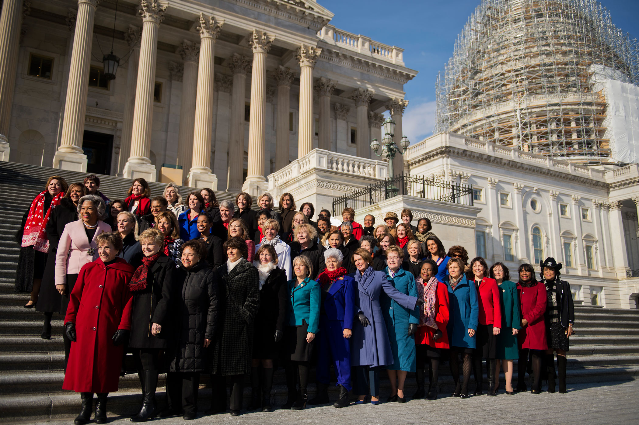 House Democratic women of the 114th Congress including House Minority Leader Nancy Pelosi, pose for a picture on the House steps of the Capitol, Jan. 7, 2015. (Tom Williams—CQ-Roll Call/Getty Images)