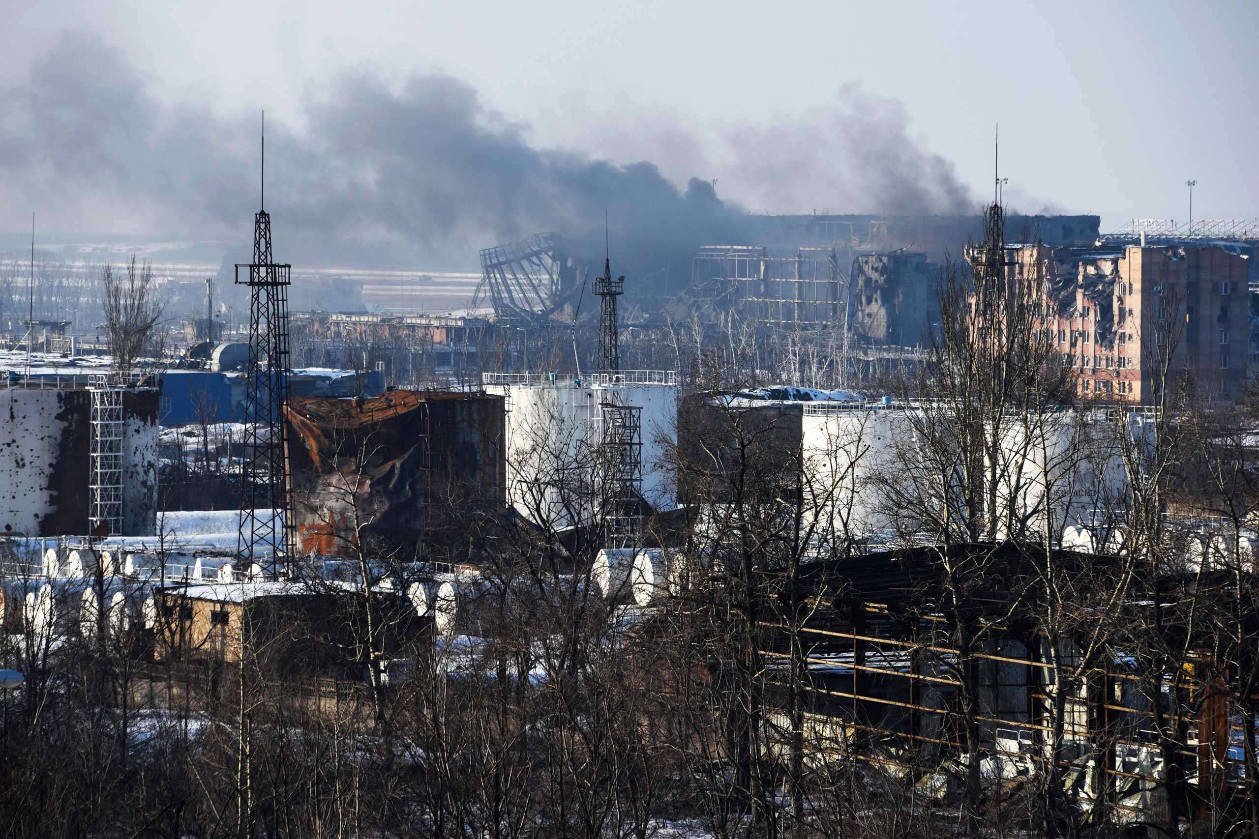 Smoke rises over the new terminal of Donetsk airport, Jan. 15, 2015.