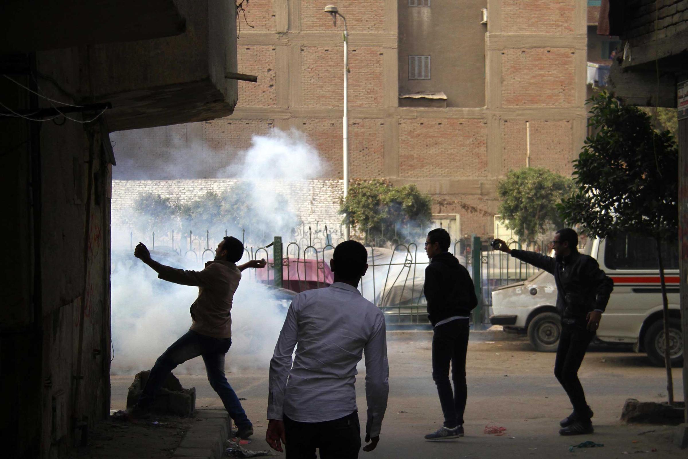 Supporters of Egypt's ousted President Mohamed Morsi are seen in clashes with the police during a demonstration in the district of Al Matarya, eastern Cairo on Jan. 25, 2015,