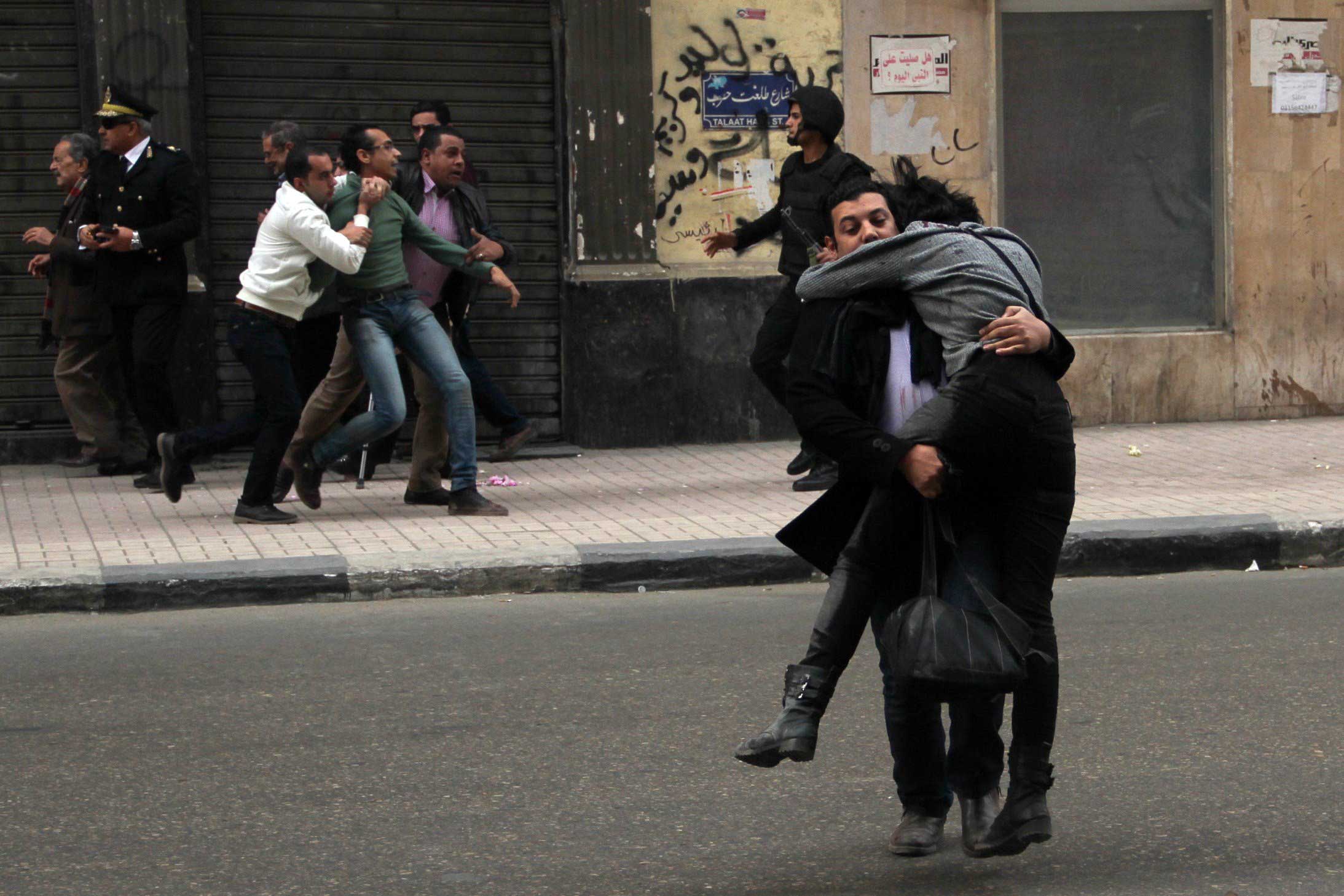 Shaima al-Sabbagh is carried away after being shot in Cairo, Jan. 24, 2015.