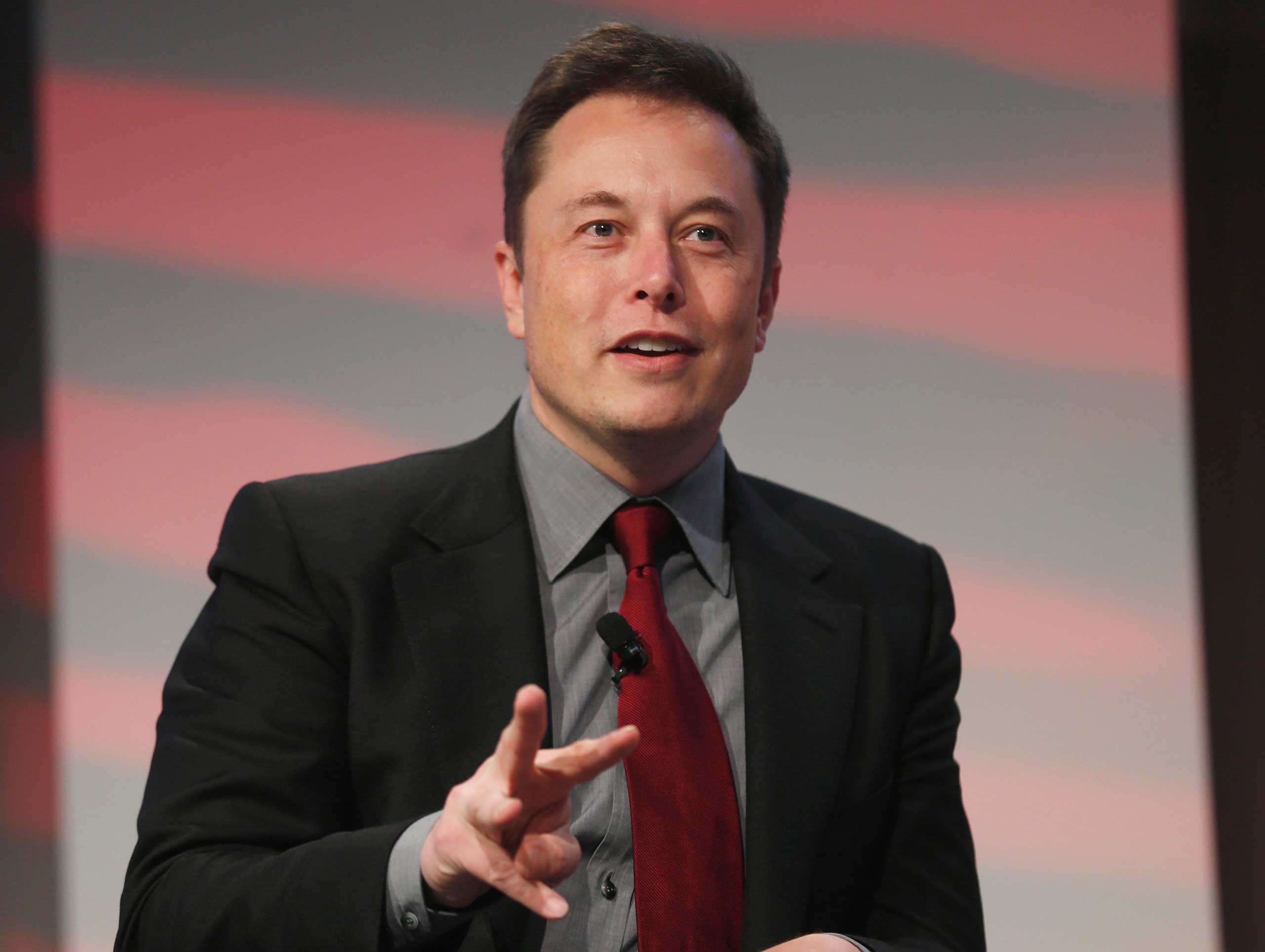 Tesla Motors CEO Elon Musk talks at the Automotive World News Congress at the Renaissance Center in Detroit
