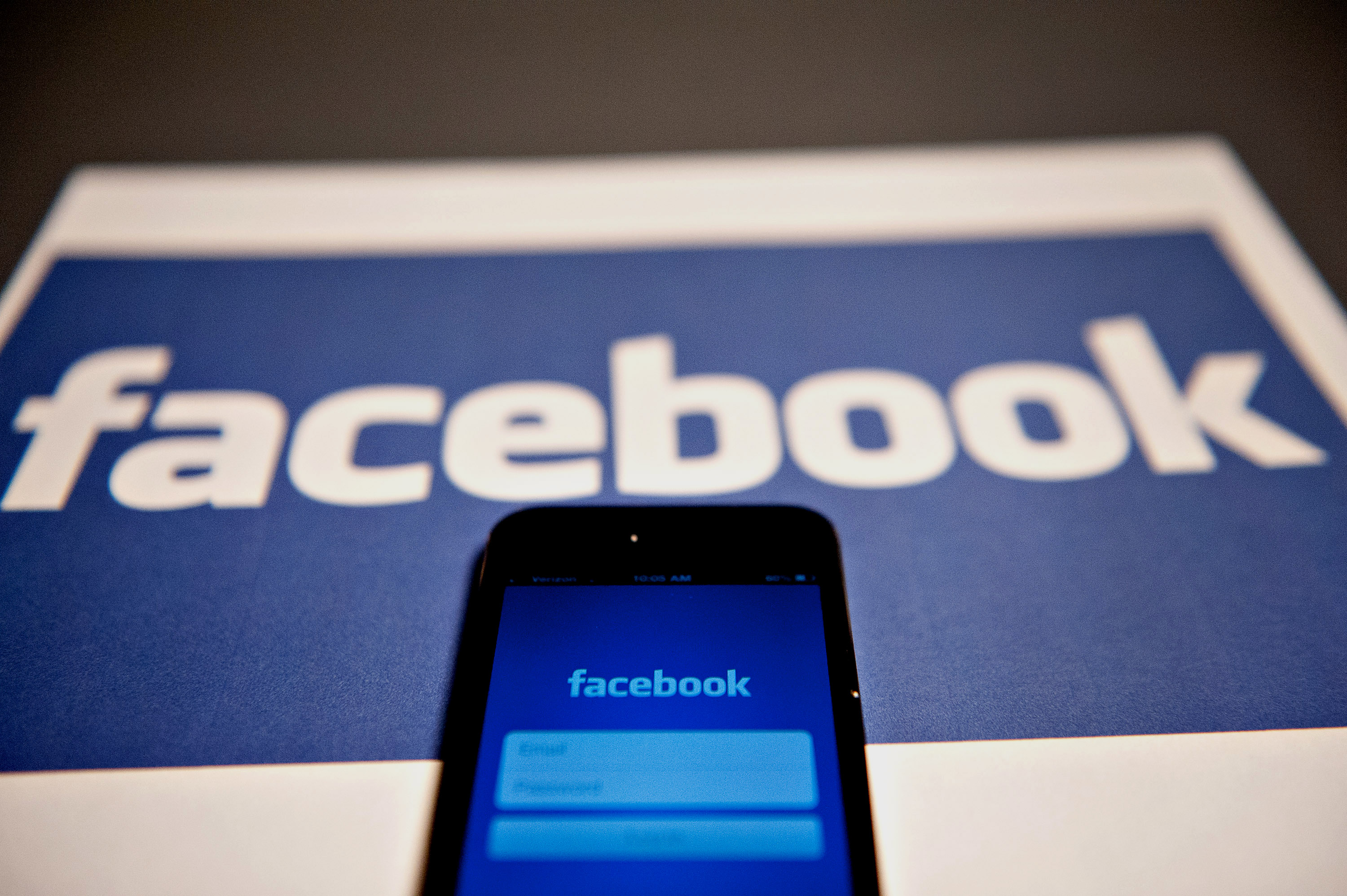 The login page for the Facebook Inc. mobile application is displayed on an Apple Inc. iPhone 5. (Bloomberg—Getty Images)