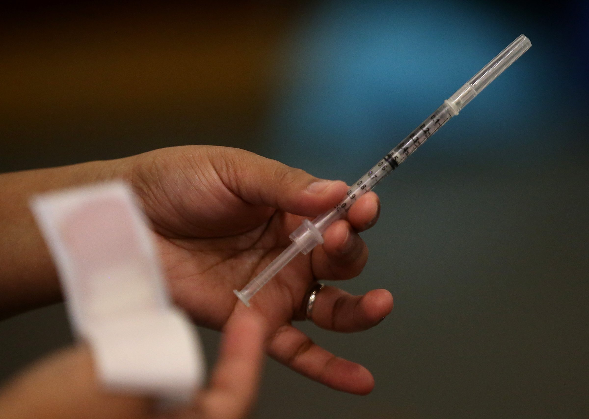 A Walgreens employee holds a flu shot clinic on Dec. 19, 2014 in Oakland, California.