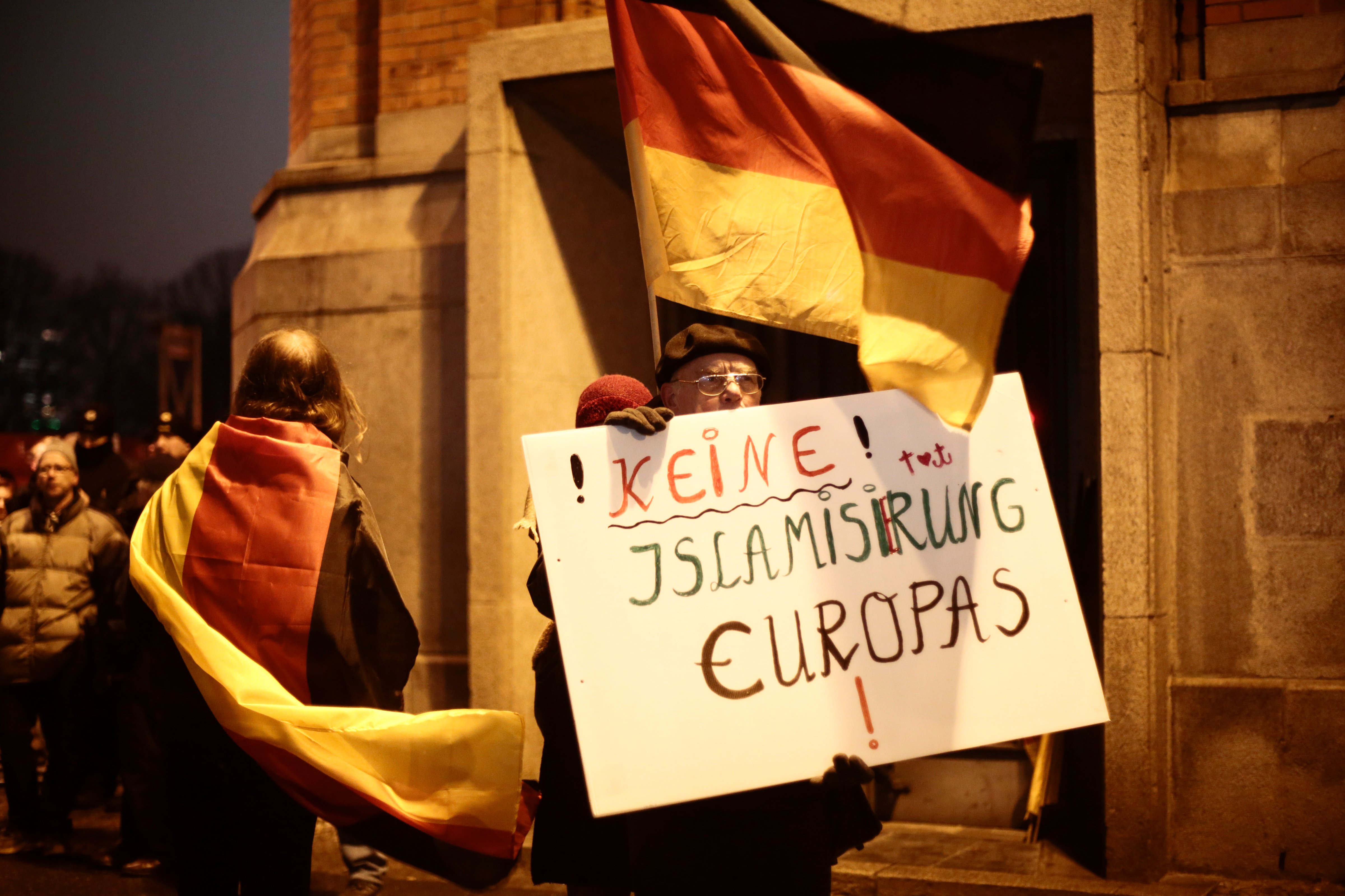 A protester holds a poster reading "No Islamisation of Europe" during the demonstration called "Berlin Patriots Against the Islamization of the West" in Berlin on Jan. 5, 2015 (Markus Schreiber—AP)