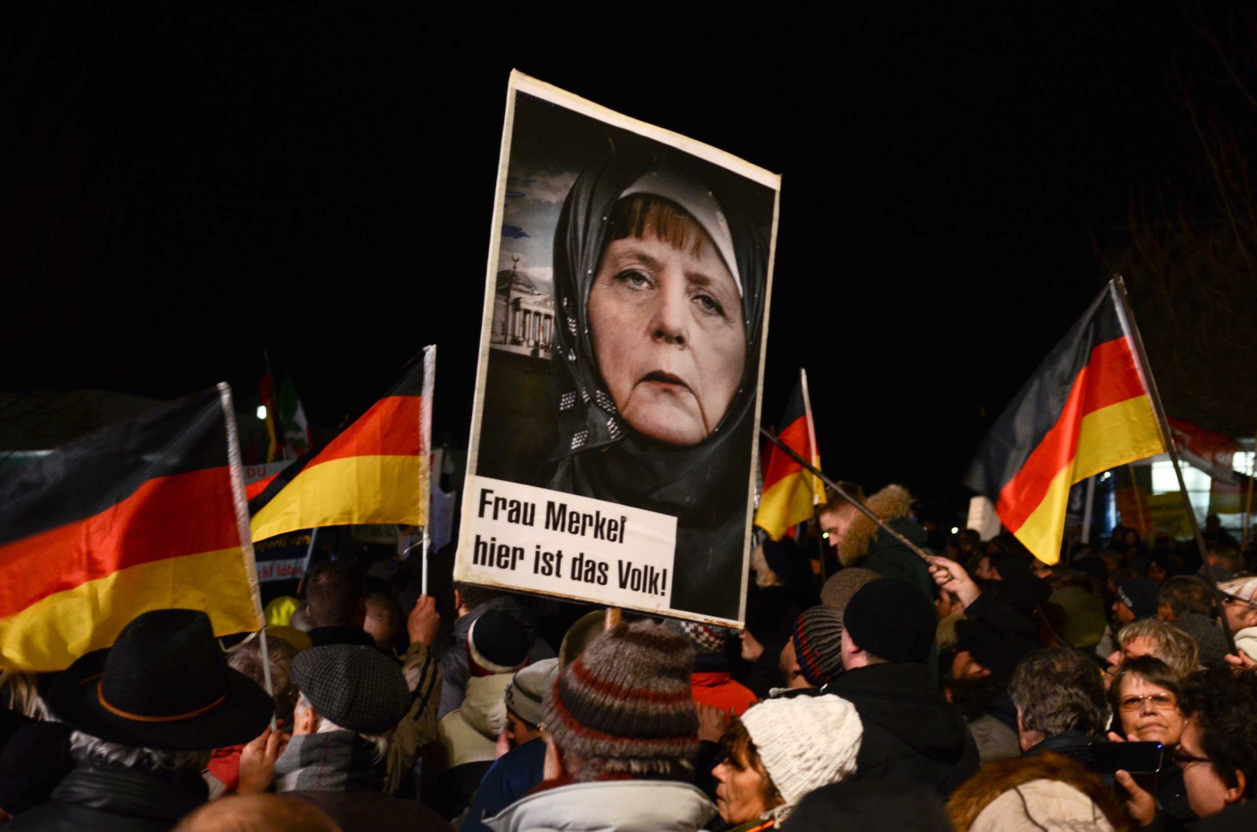 Thousands of PEGIDA (Patriotic Europeans Against the Islamization of the West) supporters march in Dresden, Germany on Jan. 12, 2014. (Epoca Libera—Demotix/Corbis)