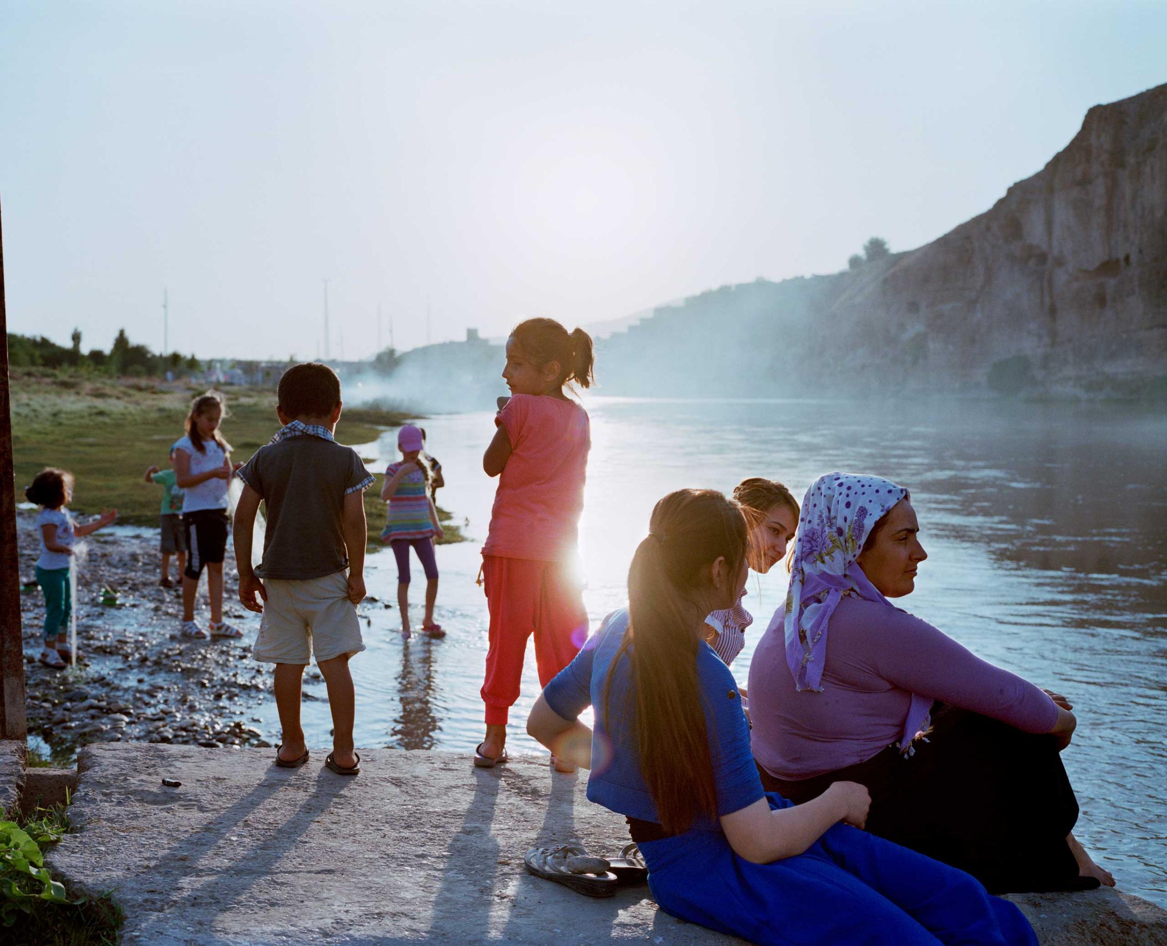 The Ilisu dam project due in 2014 will flood 80% of the ancient monuments of Hasankeyf along with 52 other villages and 15 small towns. By 2016, it will destroy 400 kilometers of the Tigris’s ecosystem. Children playing by the banks of the Tigris river. The river is predominant in the life of the inhabitants of the region of Hasankeyf, Turkey.