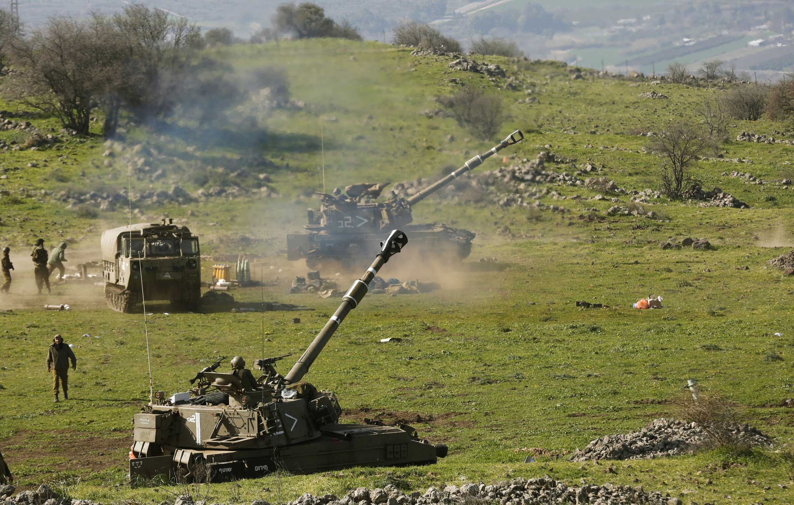 Israeli artillery fire toward targets in Lebanon near Har Dov area, on the Israeli-Lebanese border,  Jan. 28, 2015. (Atef Safadi—EPA)