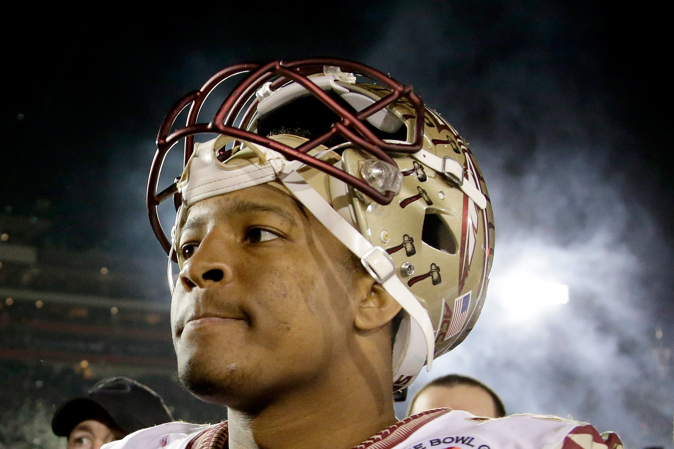 Quarterback Jameis Winston of the Florida State Seminoles reacts after losing 59-20 to the Oregon Ducks at the Rose Bowl on Jan. 1 in California. (Jeff Gross—Getty Images)