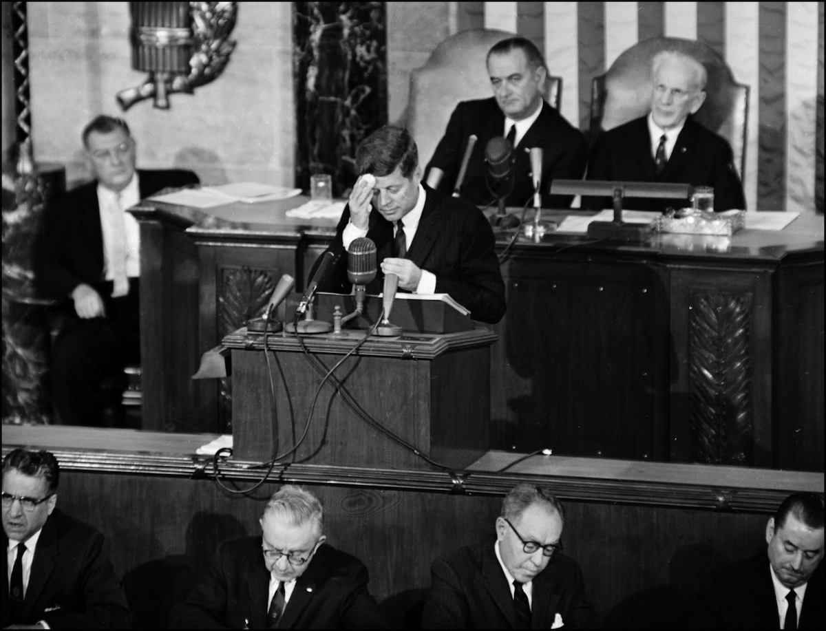 President John F. Kennedy wipes his forehead as he delivers the State of the Union address before Congress in Washington, DC, in January 1963 (AFP/Getty Images)