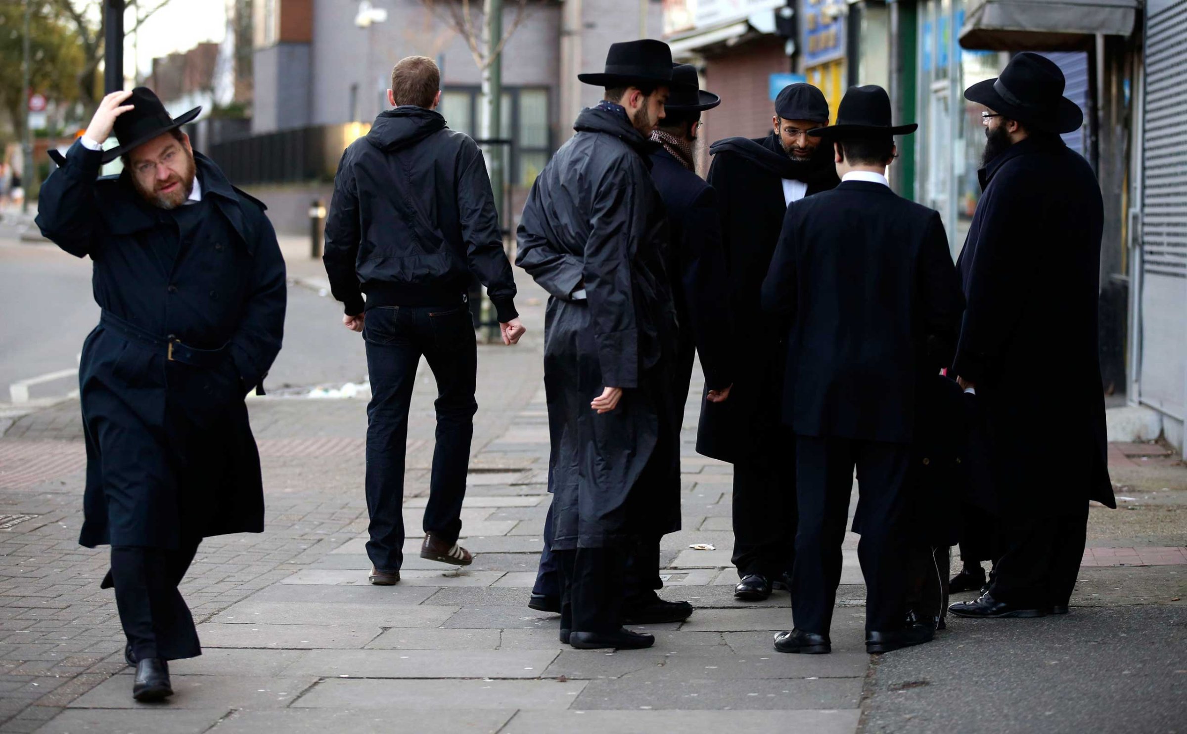 Jewish men talk in Golders Green, London, Jan. 10, 2015.