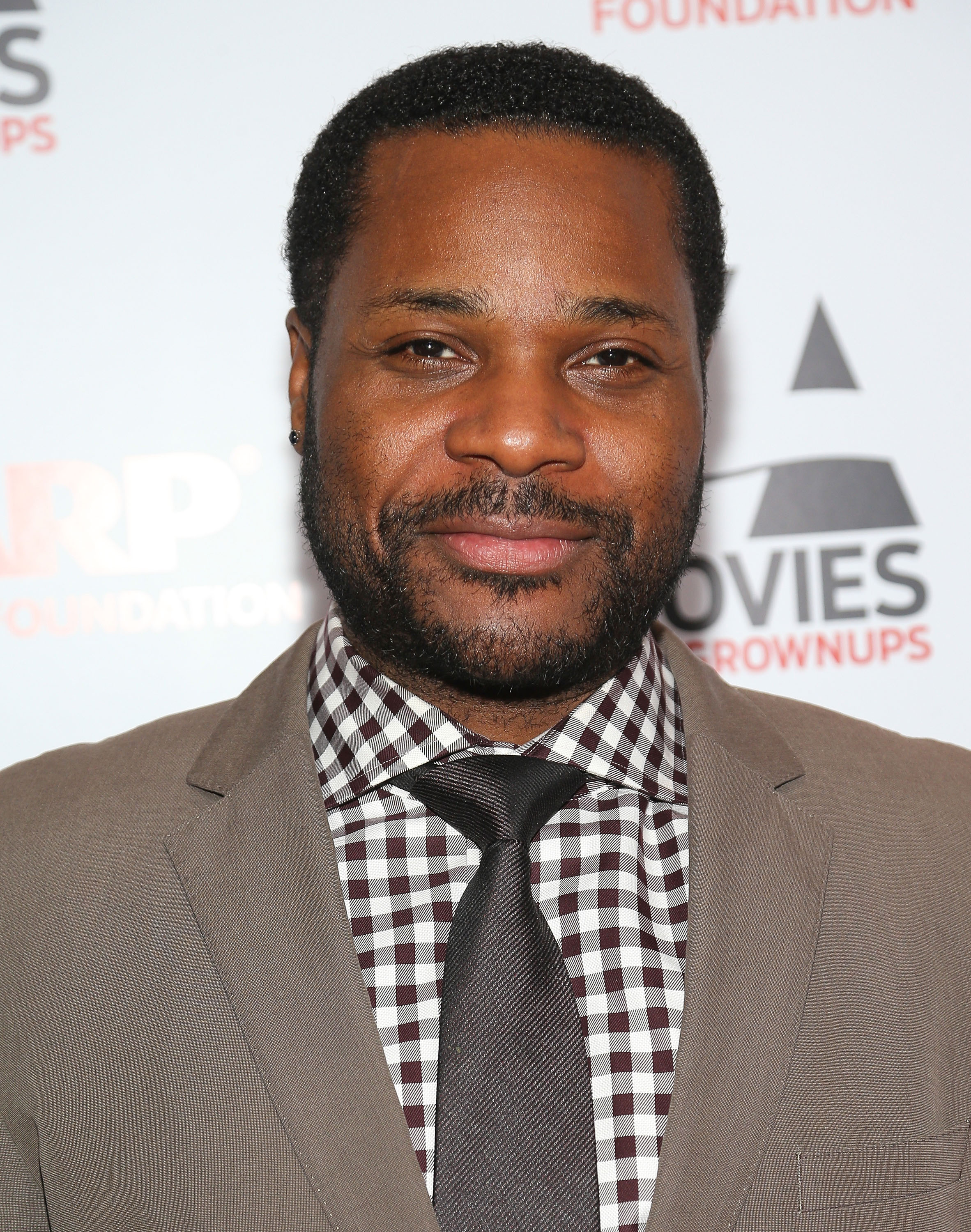 Actor Malcolm-Jamal Warner attends the 13th Annual AARP's Movies for Grownups Awards Gala at Regent Beverly Wilshire Hotel on Feb. 10, 2014, in Beverly Hills, Calif. (Imeh Akpanudosen—Getty Images)