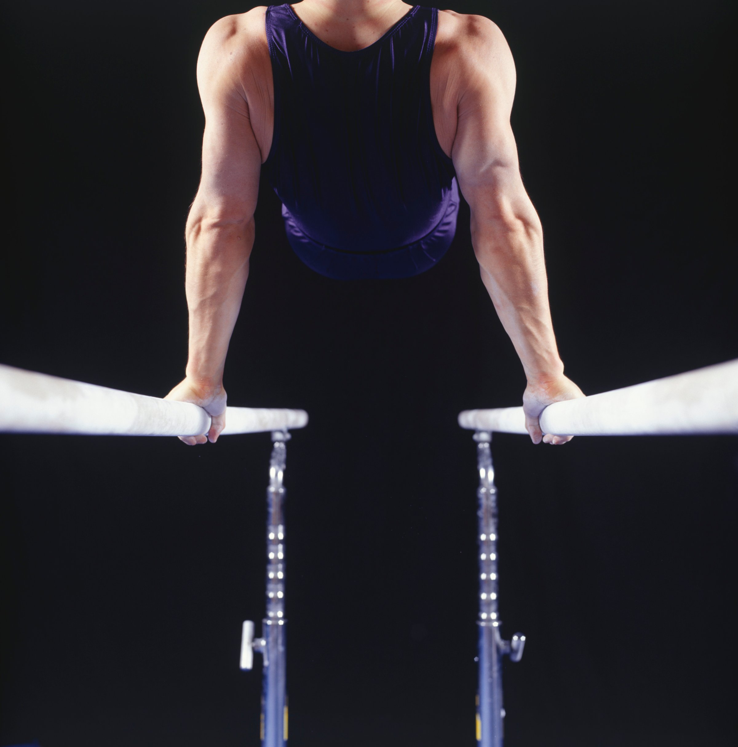 male-gymnast-parallel-bars