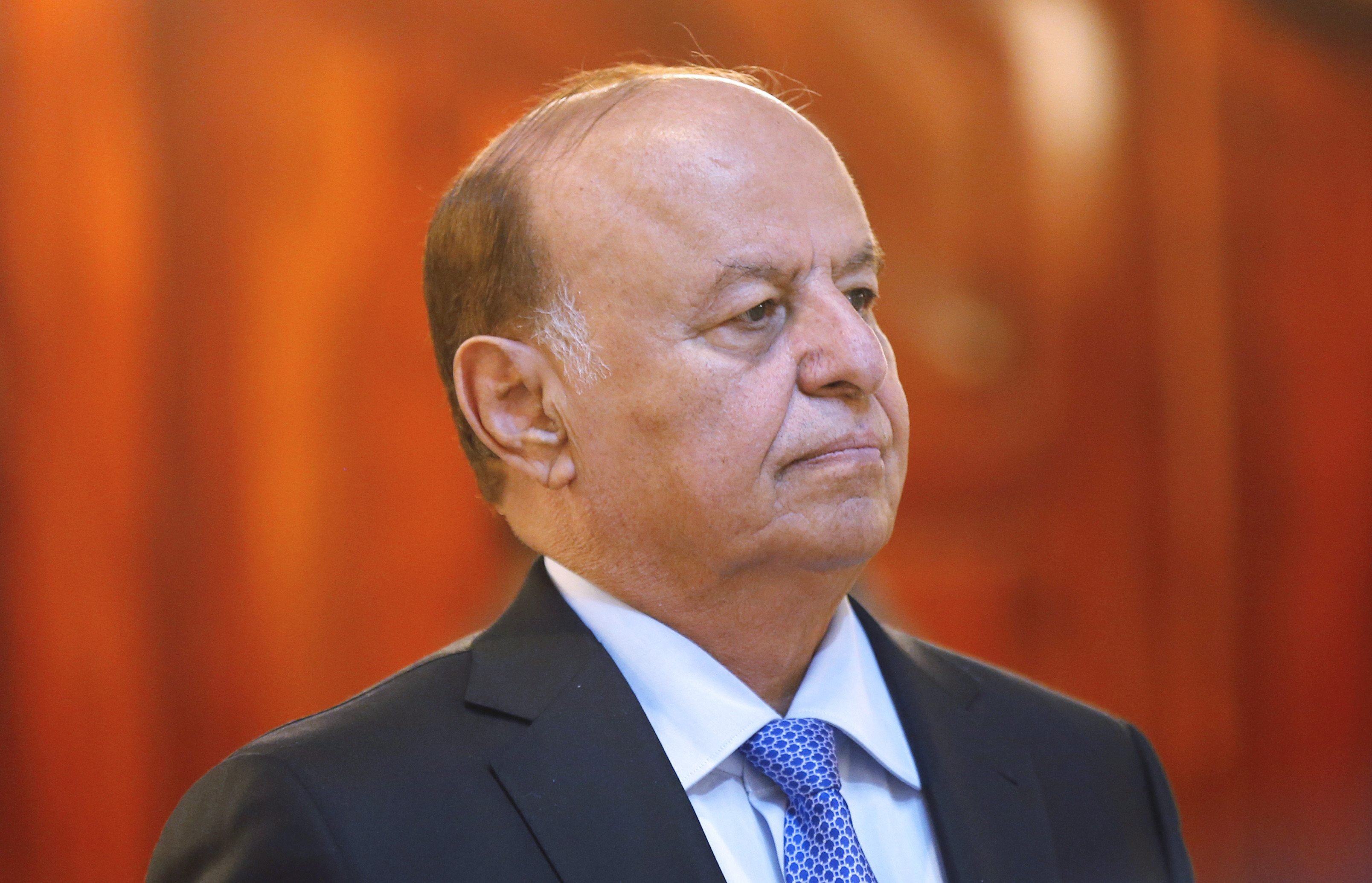 Yemen's President Abdel Rabbo Mansour Hadi stands during a reception ceremony during the holy fasting month of Ramadan at the Republican Palace in the Yemeni capital, Sana‘a, on July 7, 2014 (Khaled Abdullah—Reuters)