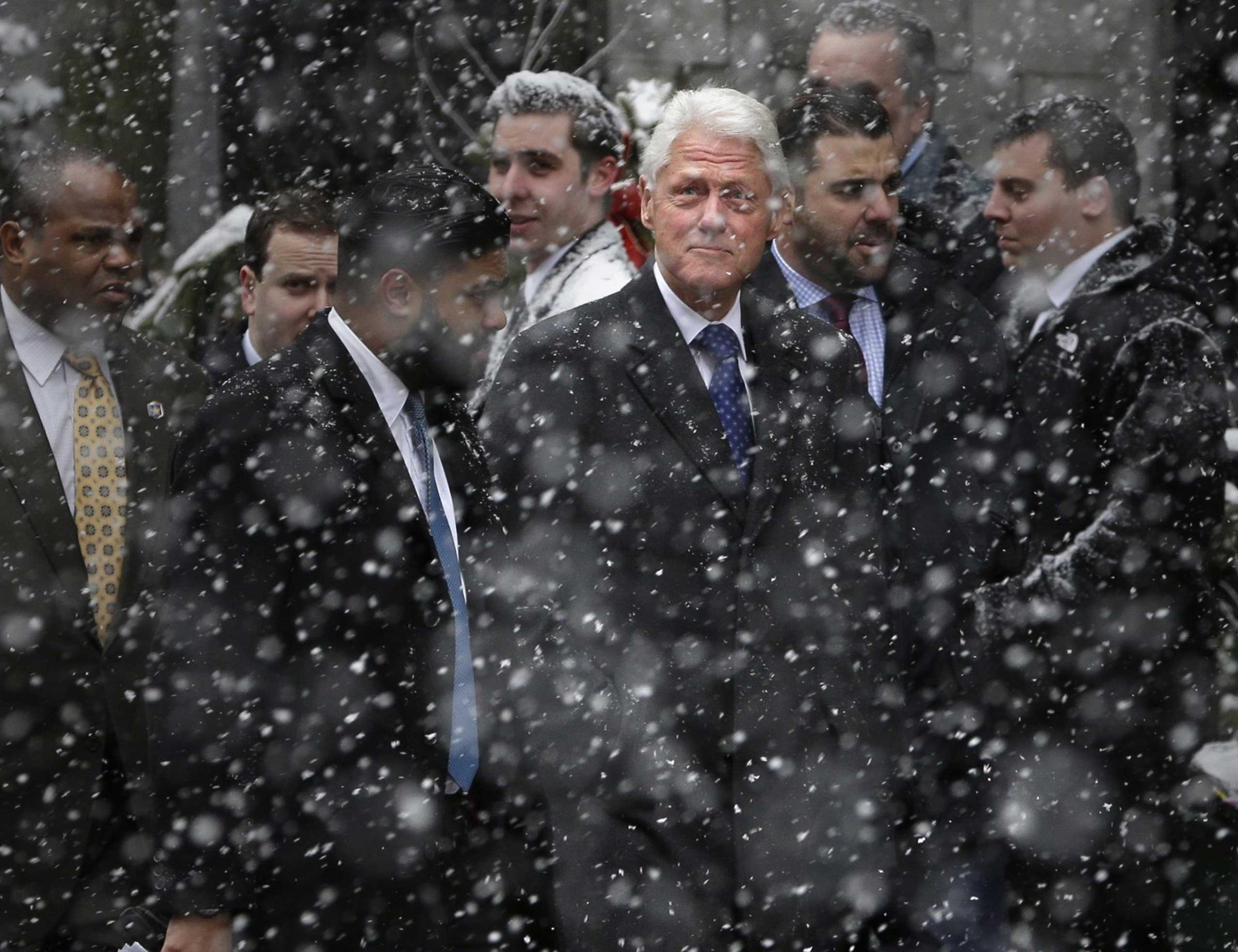 Former United States President Bill Clinton arrives for Mario Cuomo's funeral at the Church of St. Ignatius Loyola in New York on Jan. 6, 2015.