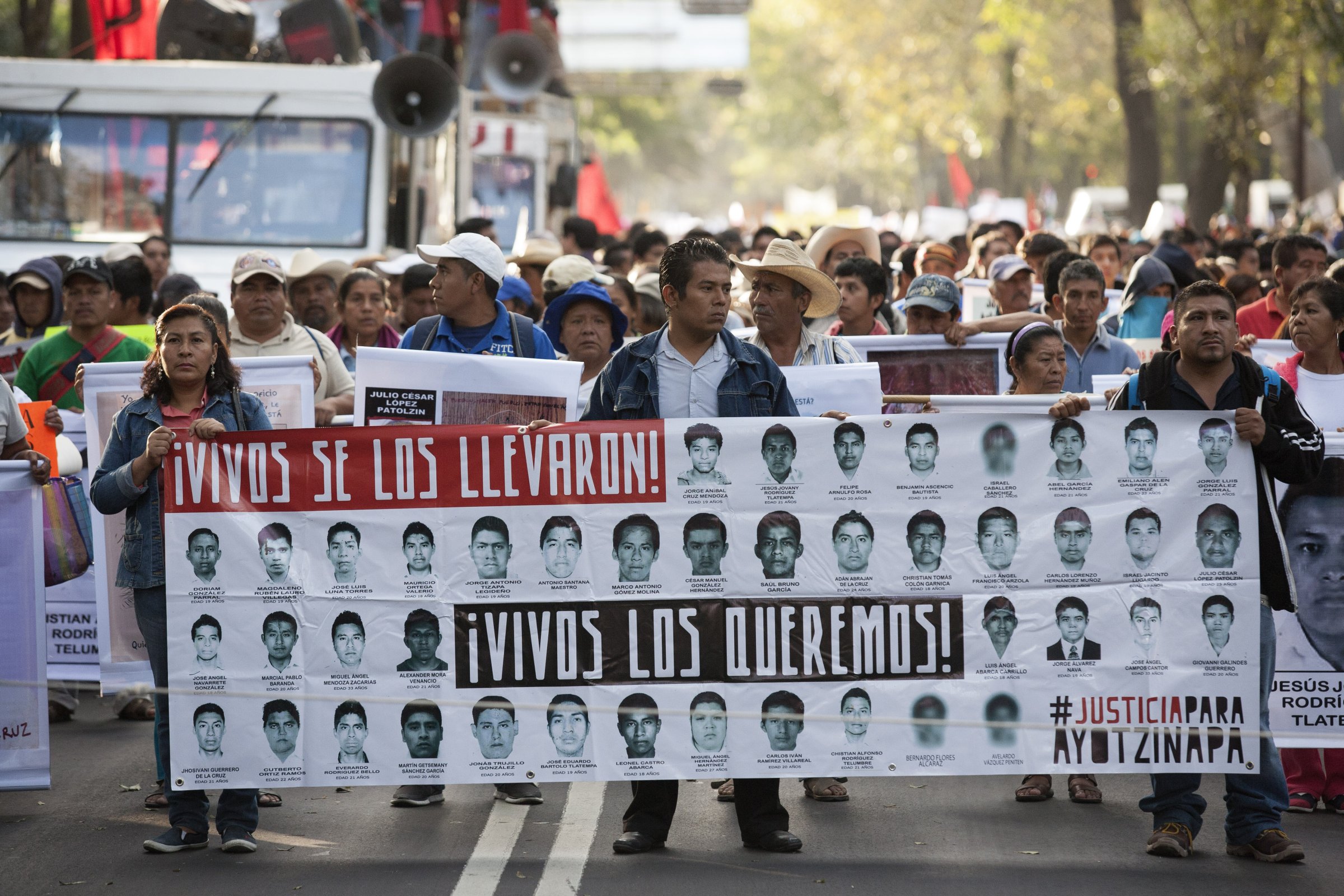 Protestors and family of 43 missing students from Guerrero State in Mexico march to protest the government and demand answers of the missing students on Nov. 5, 2014 in Mexico, City.