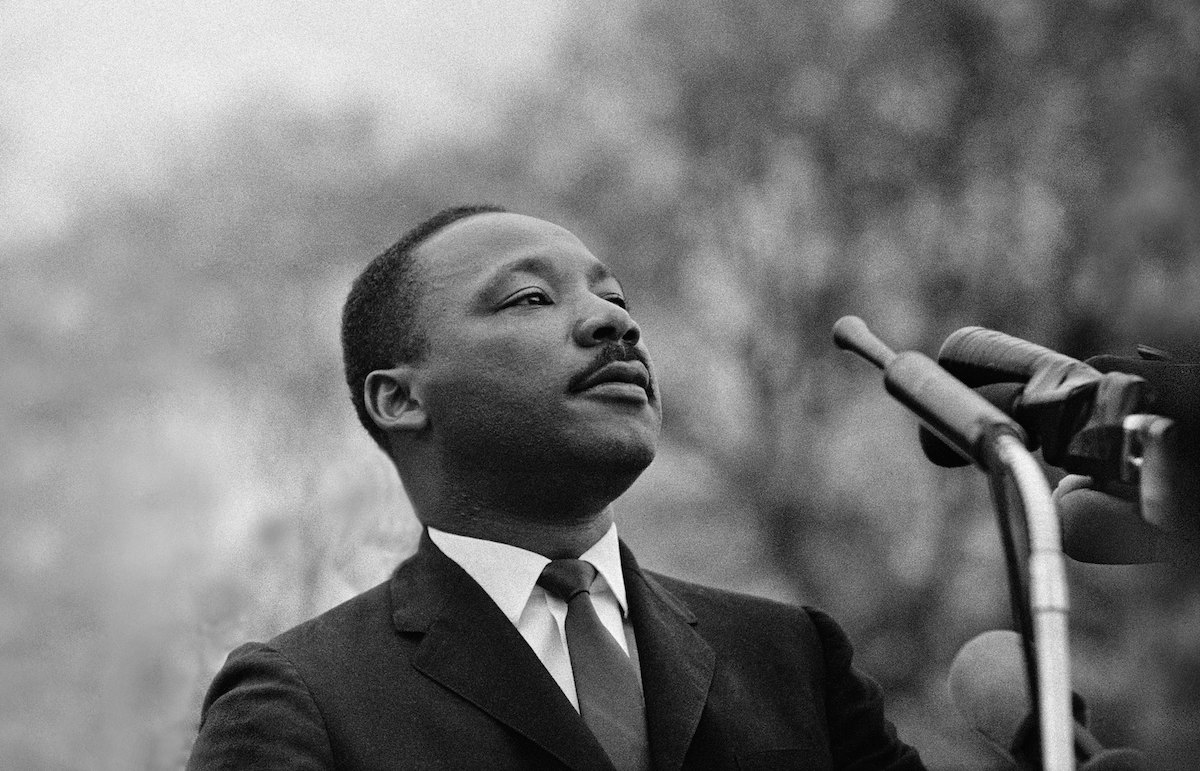 Dr. Martin Luther King, Jr. speaking before crowd of 25,000 Selma To Montgomery, Alabama civil rights marchers, in front of Montgomery, Alabama state capital building. On March 25, 1965 in Montgomery, Ala. (Stephen F. Somerstein / Getty Images)