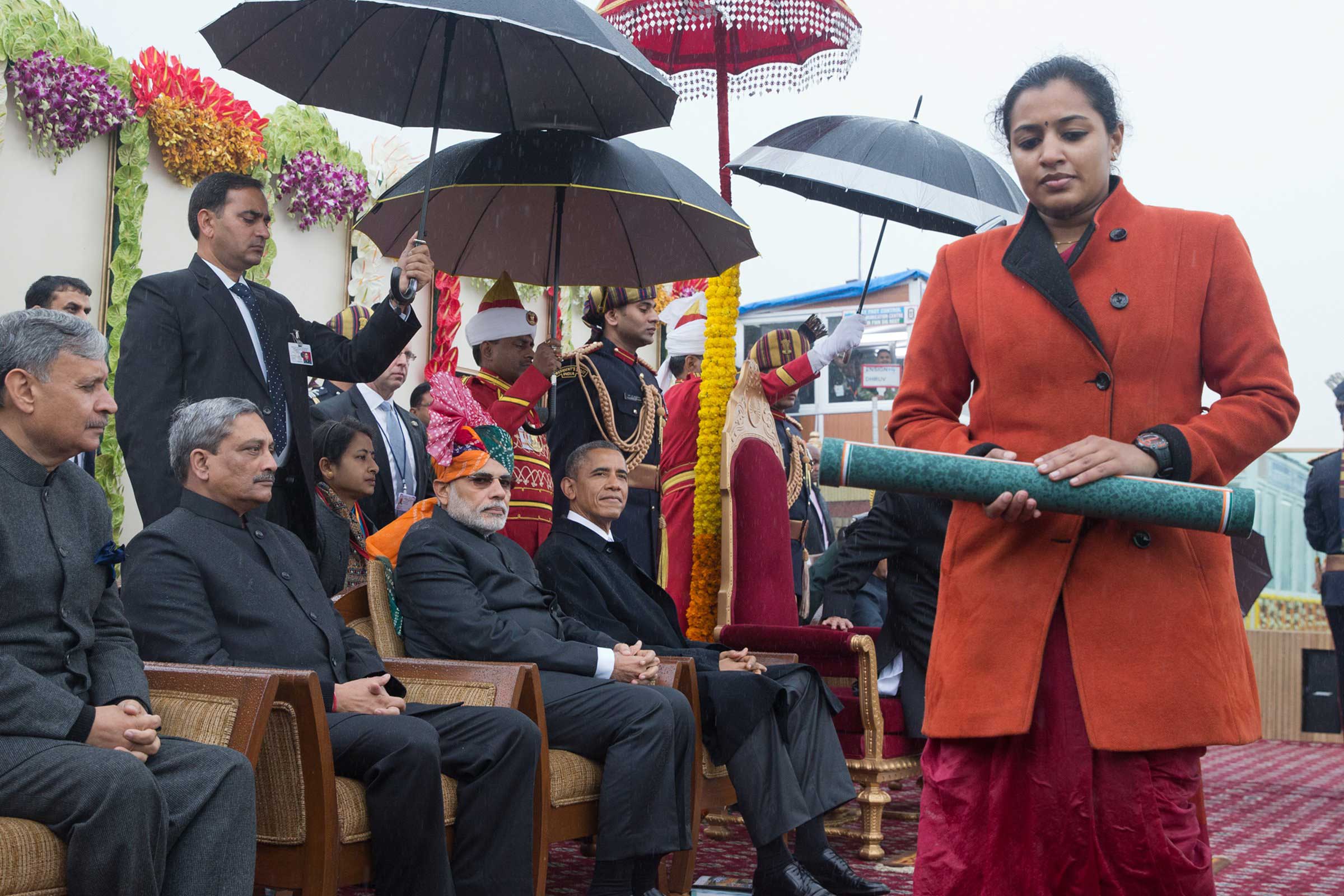 President Barack Obama and Indian Prime Minister Narendra Modi watch an award ceremony and parade from their viewing stand overlooking the Republic Day parade in New Delhi,  Jan. 26, 2015.